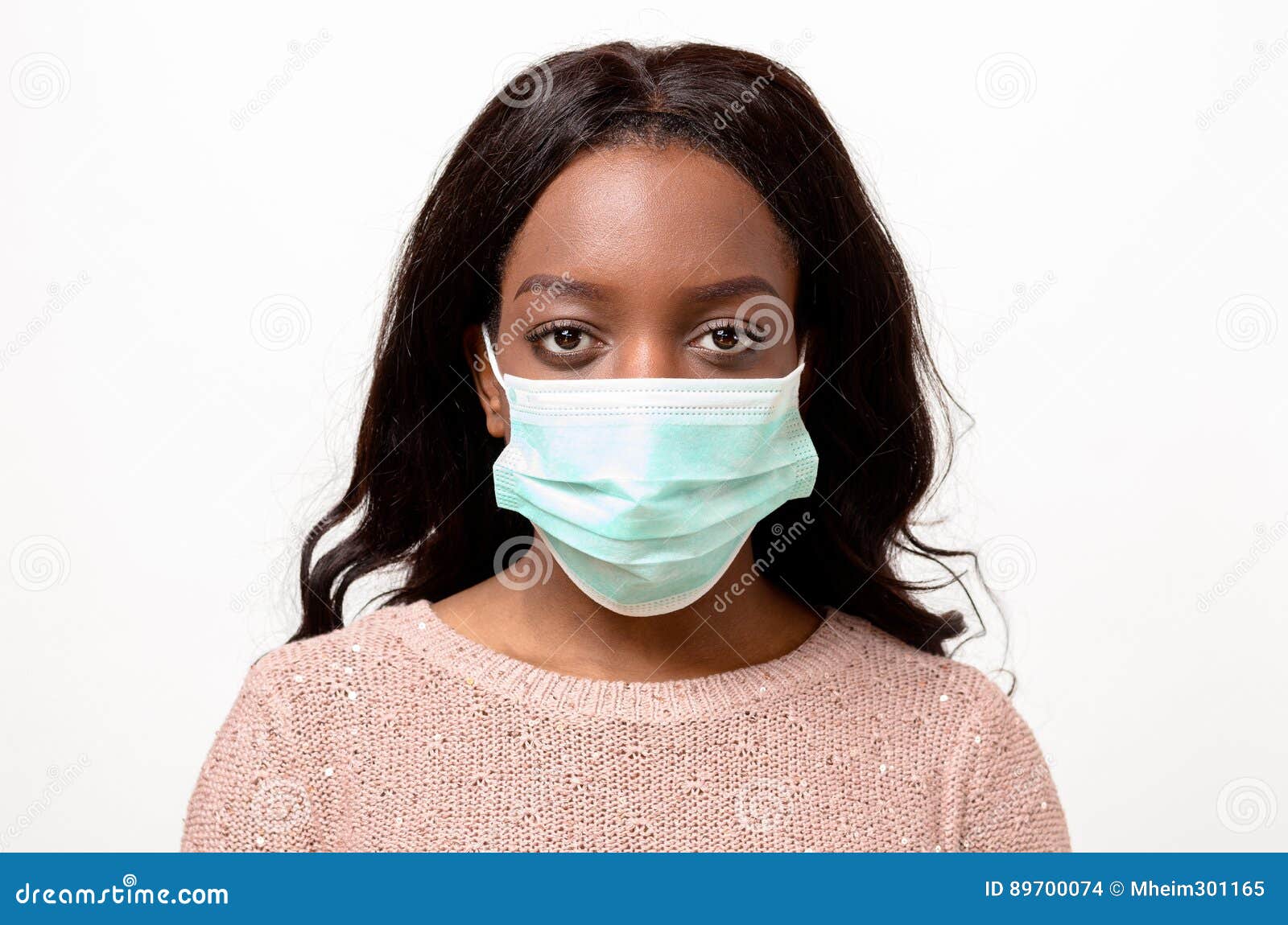 Young African Woman Wearing a Surgical Face Mask Stock Photo - Image of ...