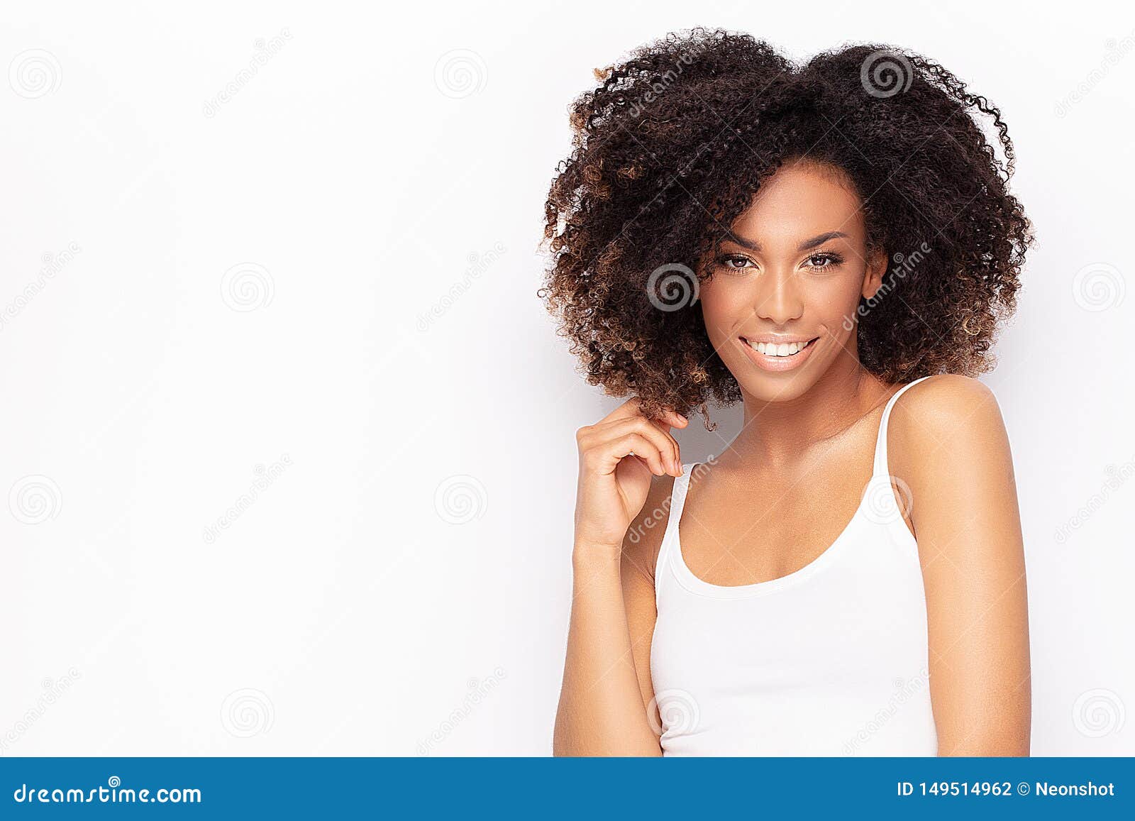 young afro girl posing in studio