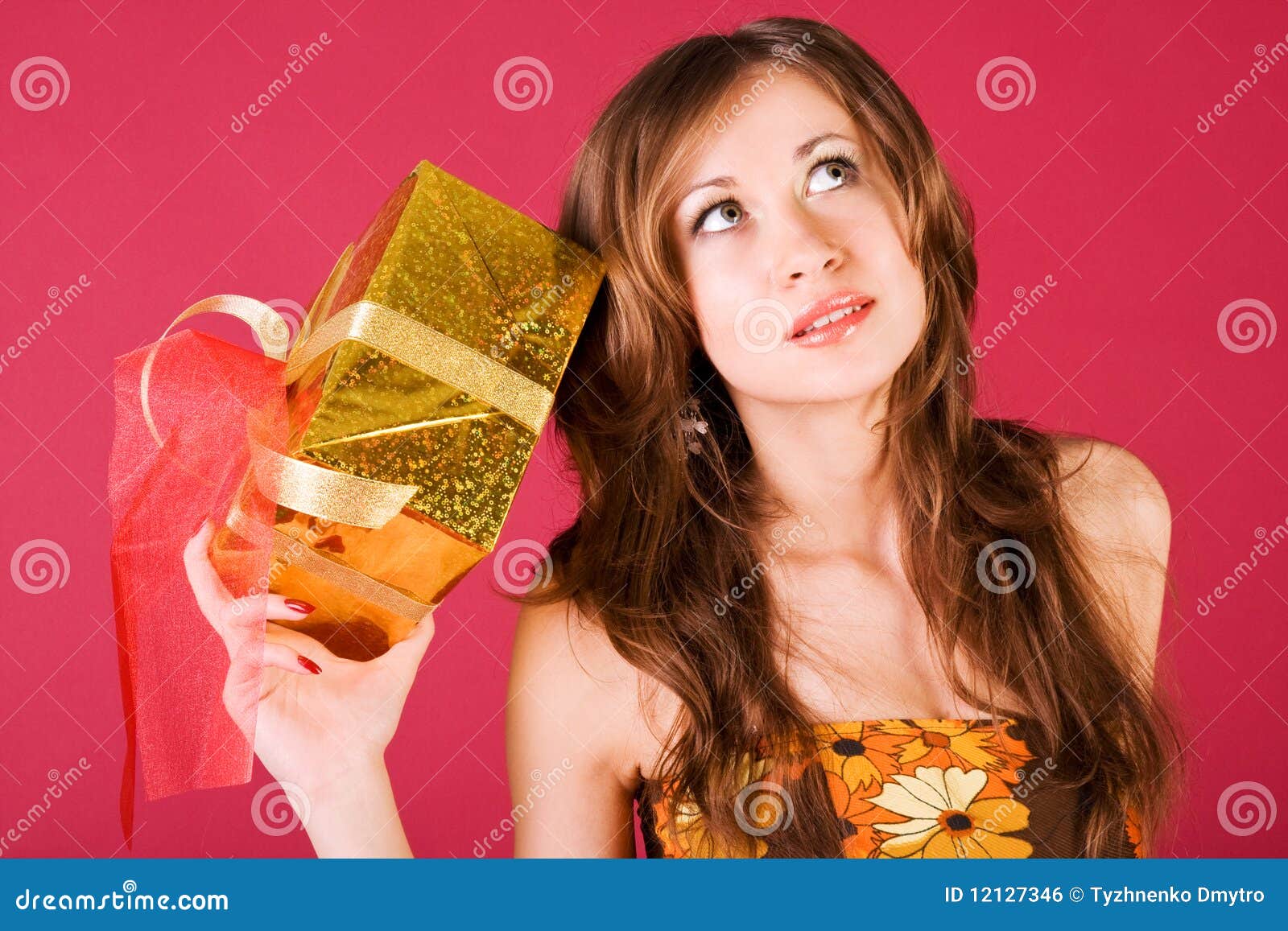 Young Alluring Girl in Dress with a Present Stock Photo - Image of ...