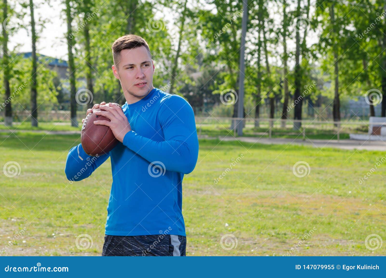 Young American Football Player with a Ball Stock Image - Image of adult