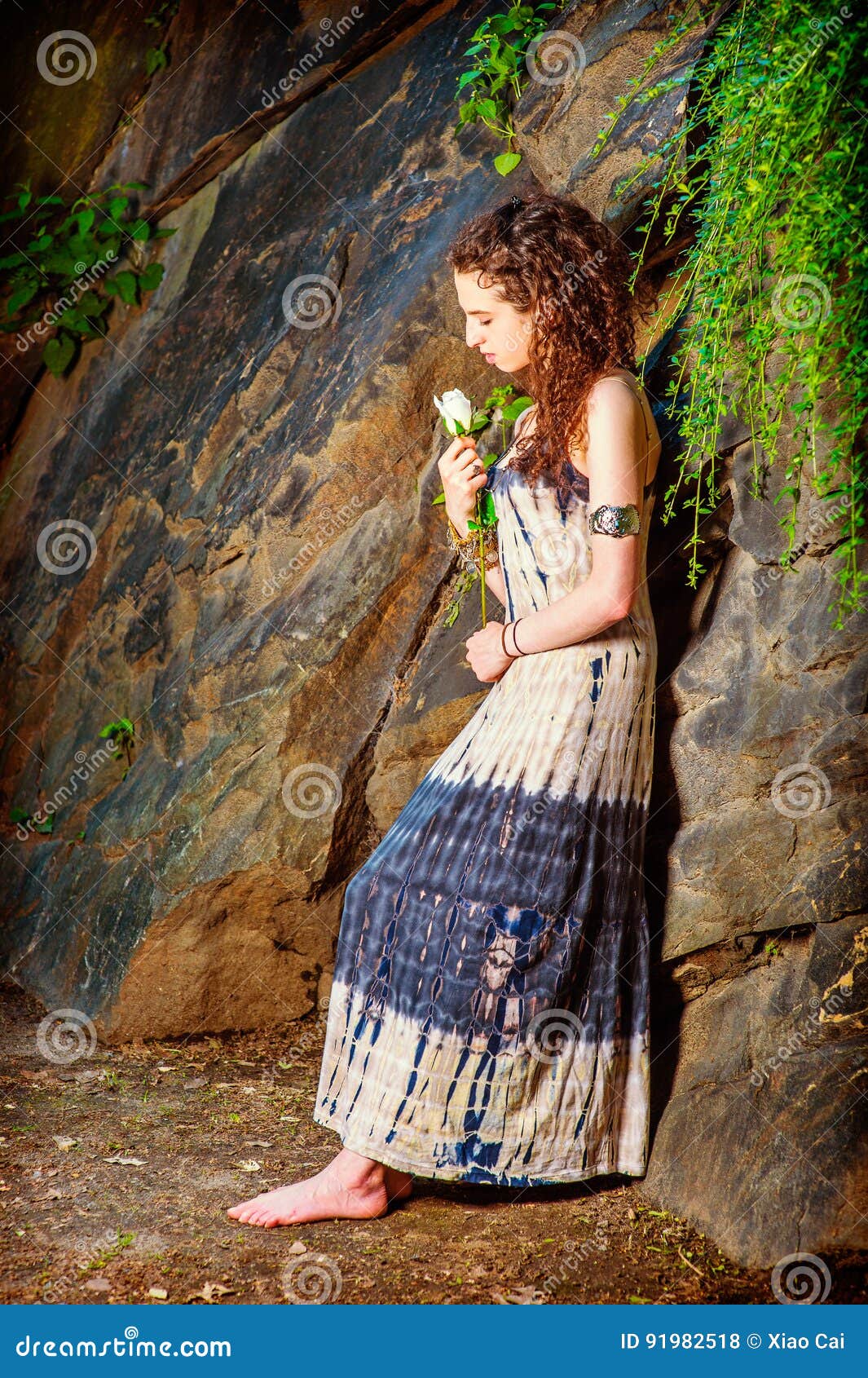 https://thumbs.dreamstime.com/z/young-american-woman-missing-you-white-rose-new-york-girl-dressing-patterned-long-dress-bracelet-barefoot-beautiful-91982518.jpg