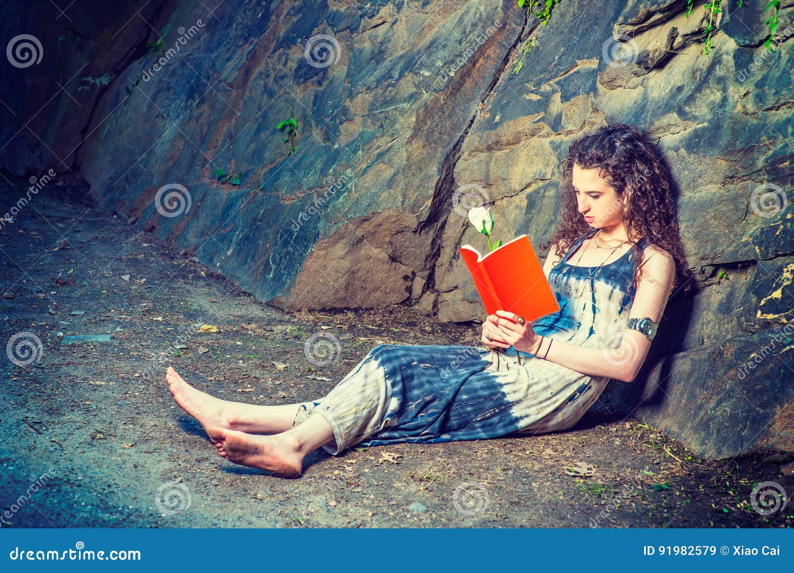 https://thumbs.dreamstime.com/z/young-american-woman-reading-red-book-sitting-ground-travel-girl-outside-wearing-long-dress-barefoot-pretty-teenage-college-91982579.jpg