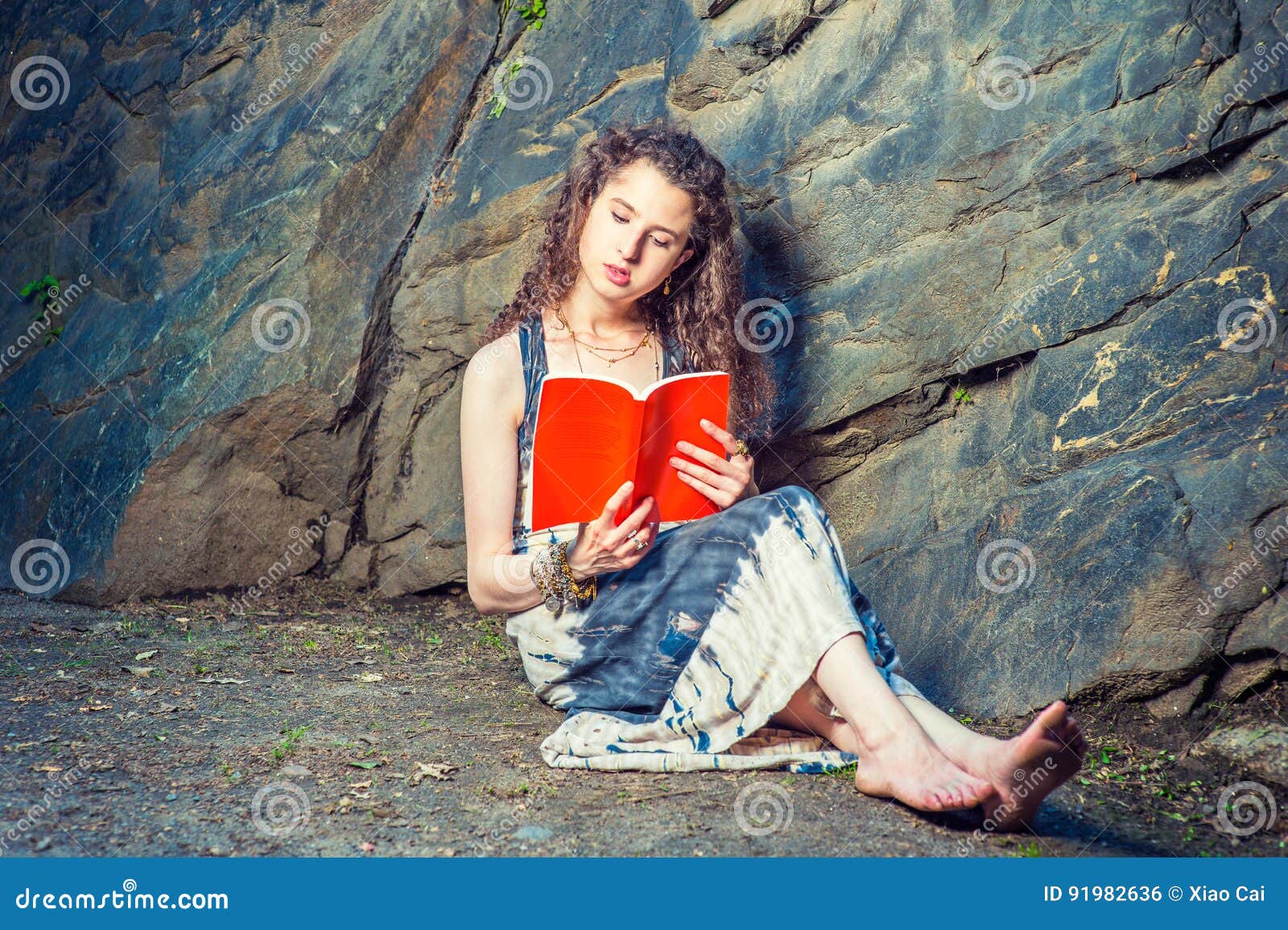 https://thumbs.dreamstime.com/z/young-american-woman-reading-red-book-sitting-ground-travel-girl-outside-wearing-long-dress-bracelet-barefoot-pretty-teenage-91982636.jpg