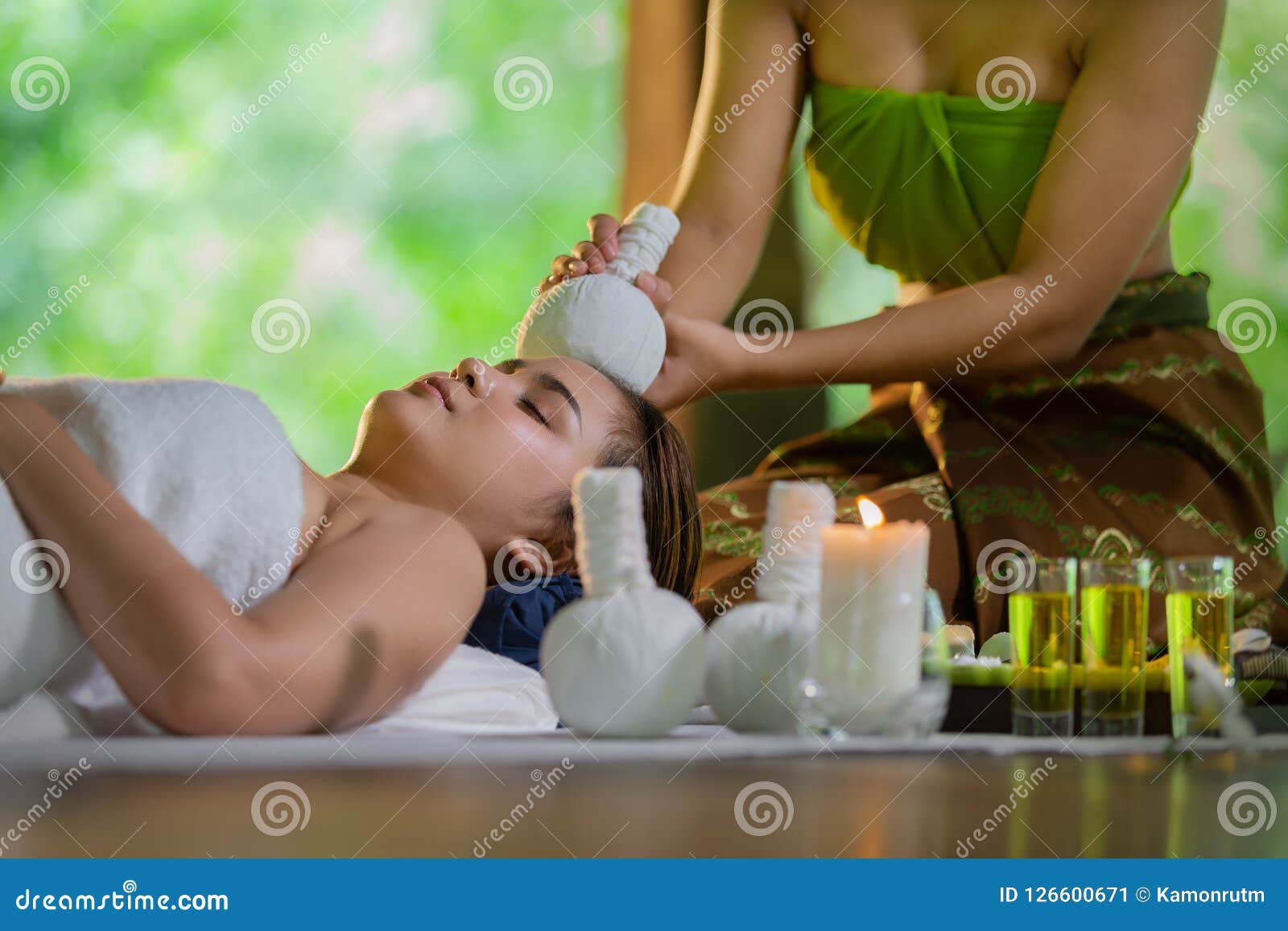 Young Asia Beautiful Woman During Massage With Spa Herbal Compre