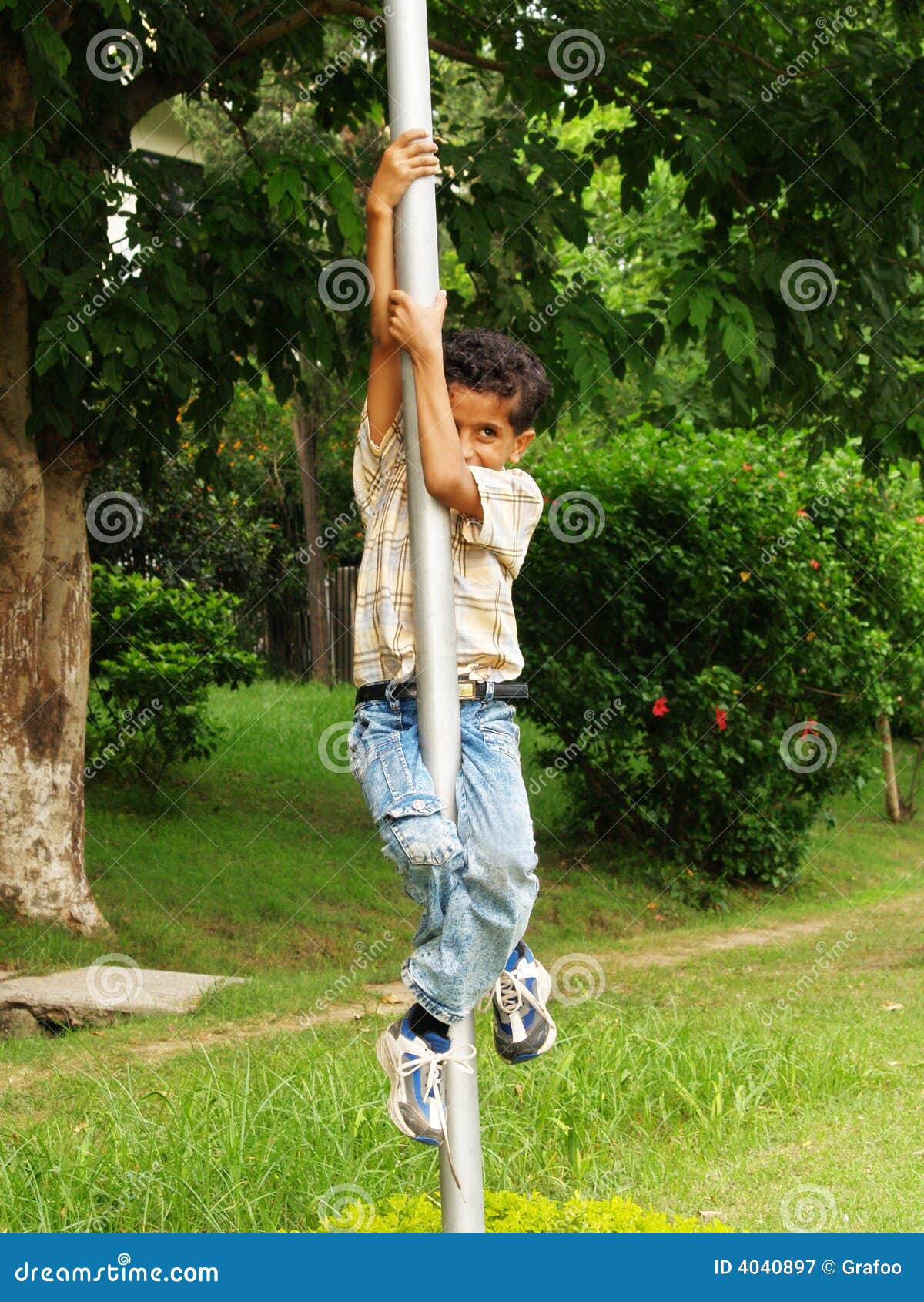 Young Asian Boy Climbing Pole Stock Image Image of playfully