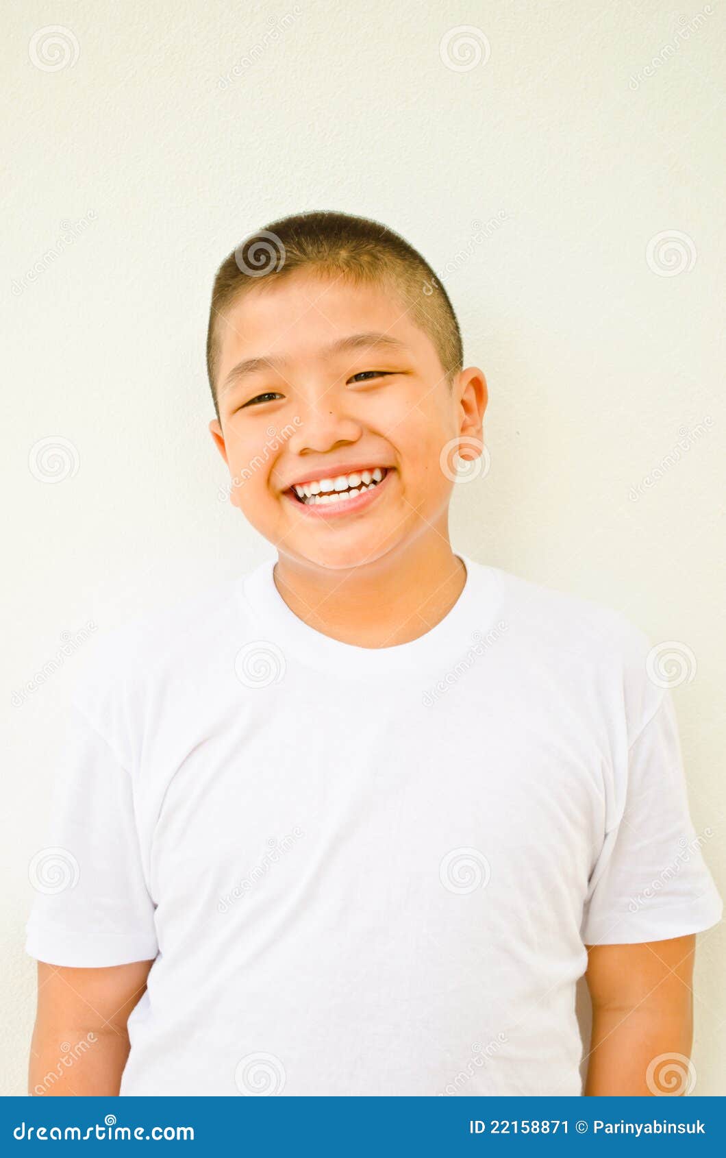 Young asian boy smiling stock image. Image of white, asia 22158871