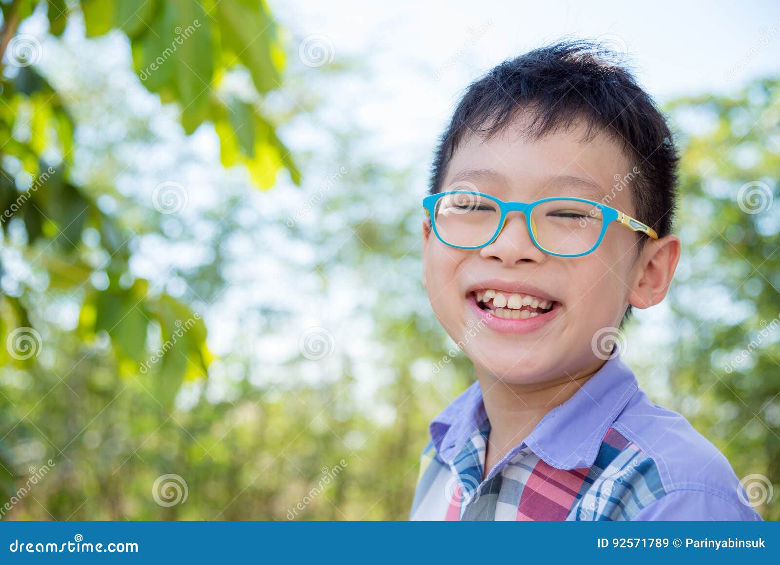 Young Asian Boy Smiling in Park Stock Image Image of thai, glasses