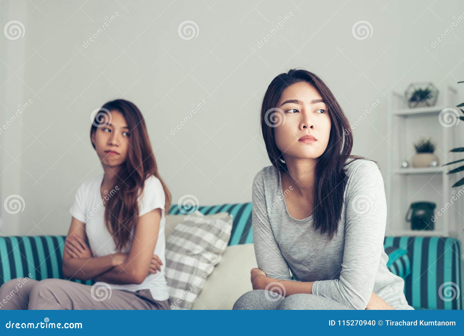 Young Asian Lesbian Couple Argue And Turn Their Back To