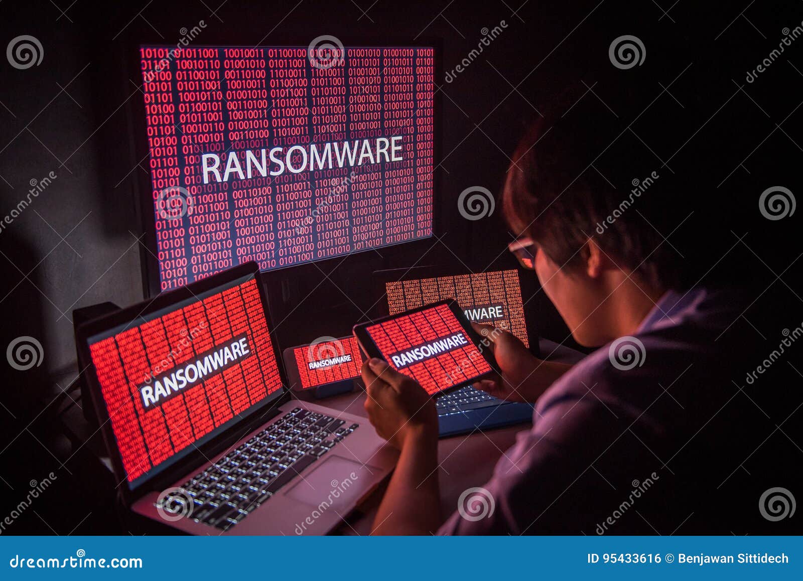 young asian male frustrated by ransomware cyber attack