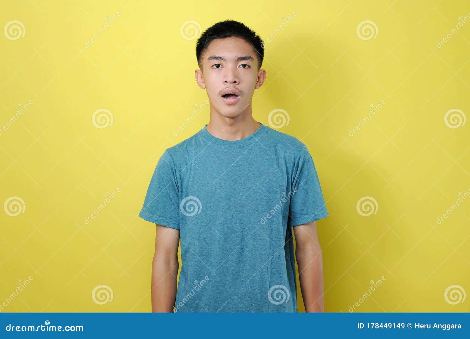 Young Asian Man Was Dumbfounded Look at Camera, His Mouth Open, Silent ...