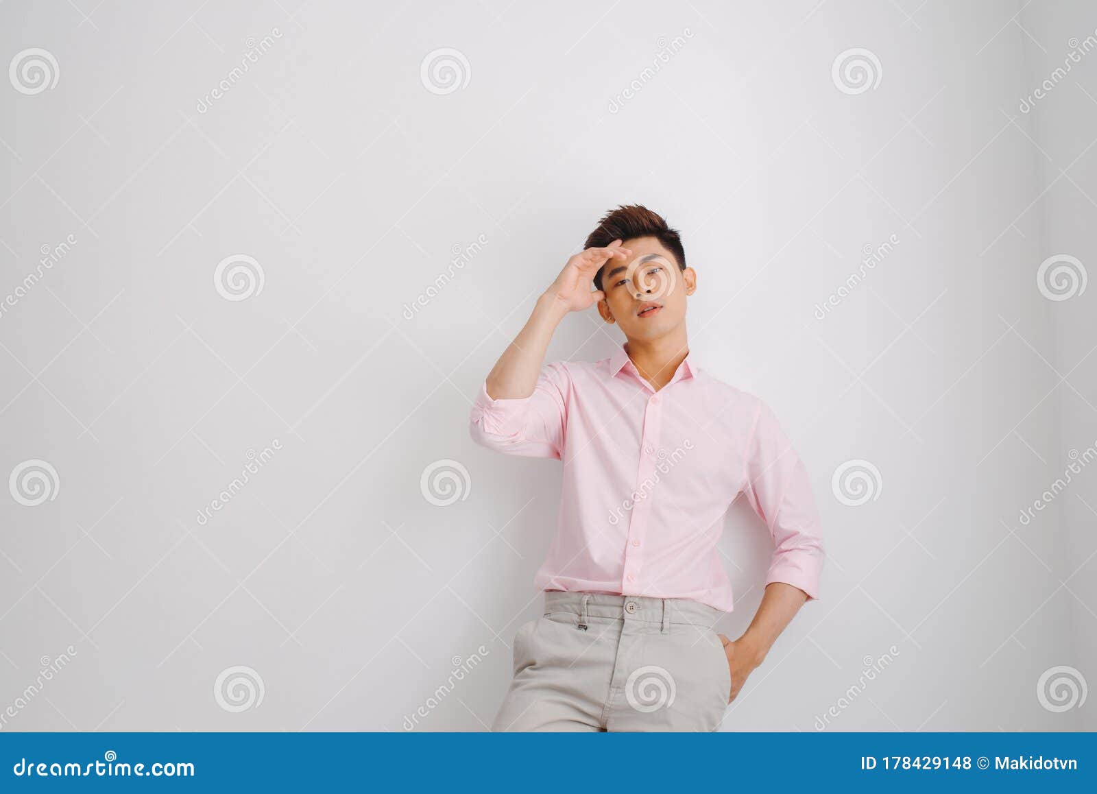 Young Asian Man Wearing Pink Shirt Standing Over White Background Stock ...