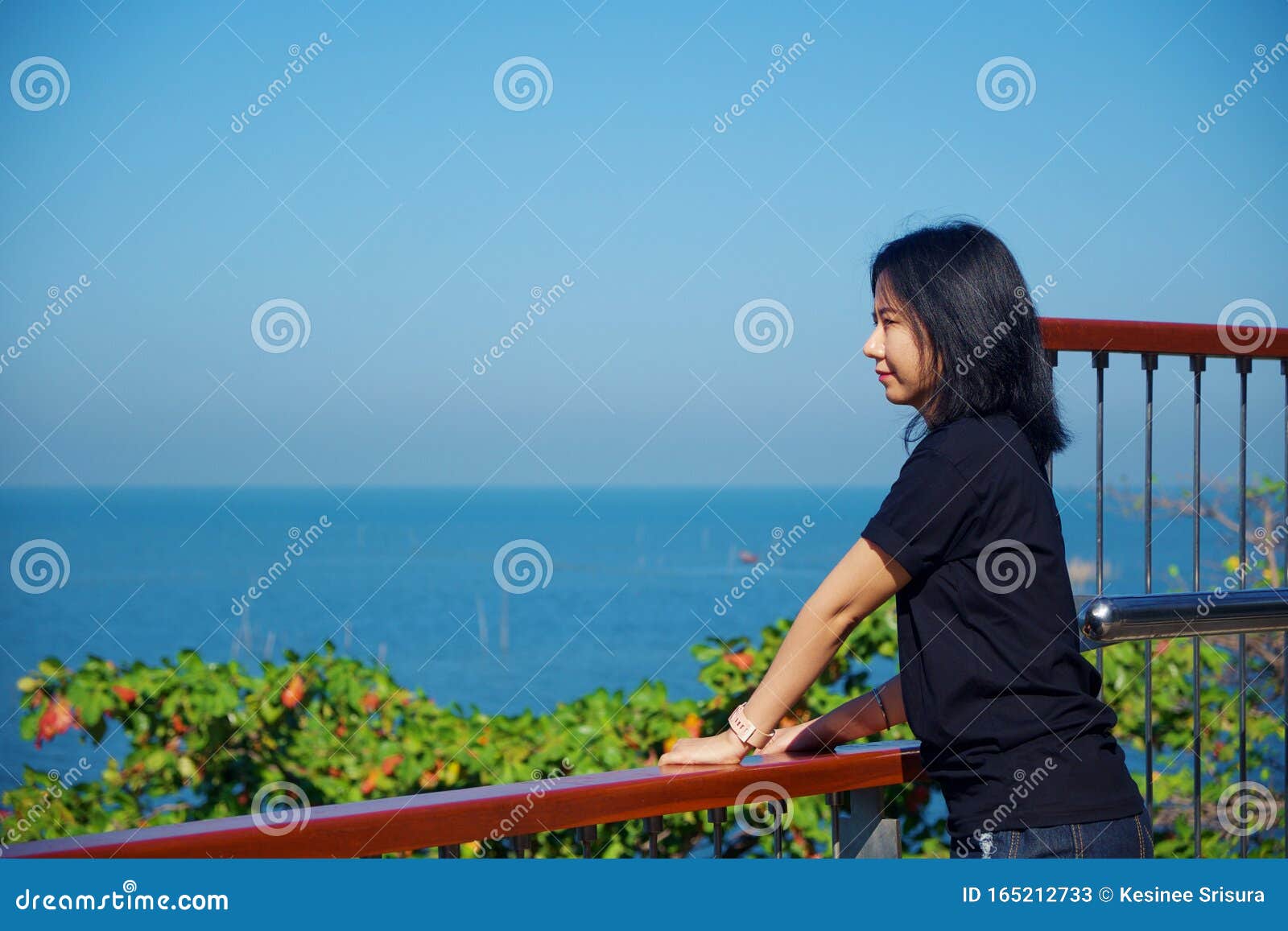 Pretty Young Girl Standing In Sea. Back Side To Camera Stock Photo, Picture  and Royalty Free Image. Image 5712697.