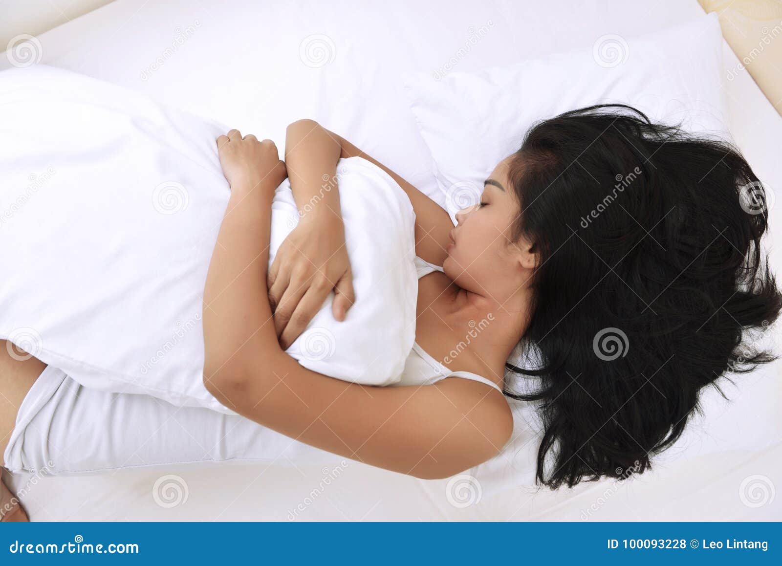 Young Asian Woman Sleeping while 
