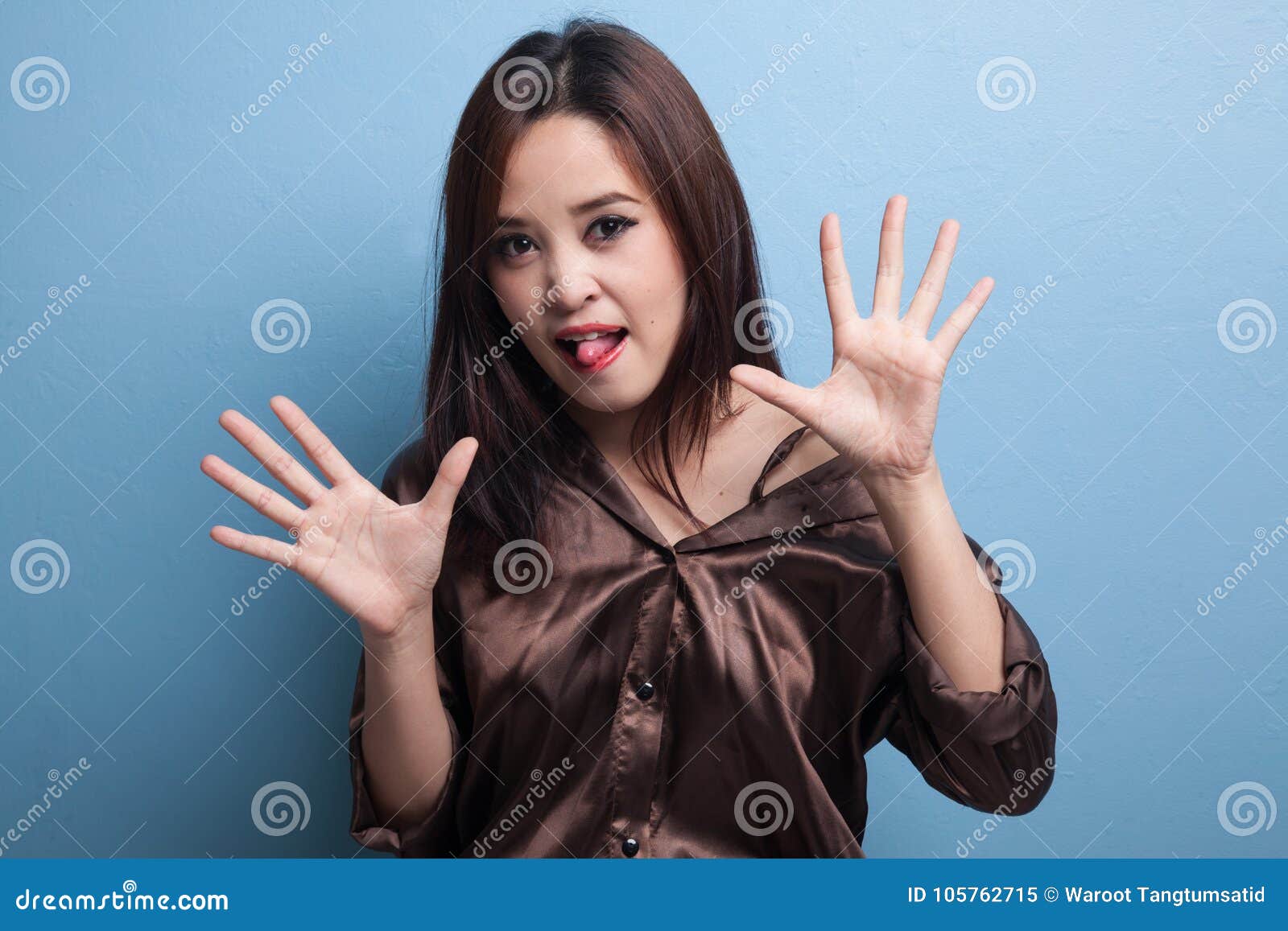 Young Asian Woman Sticking Her Tongue Out Stock Ima