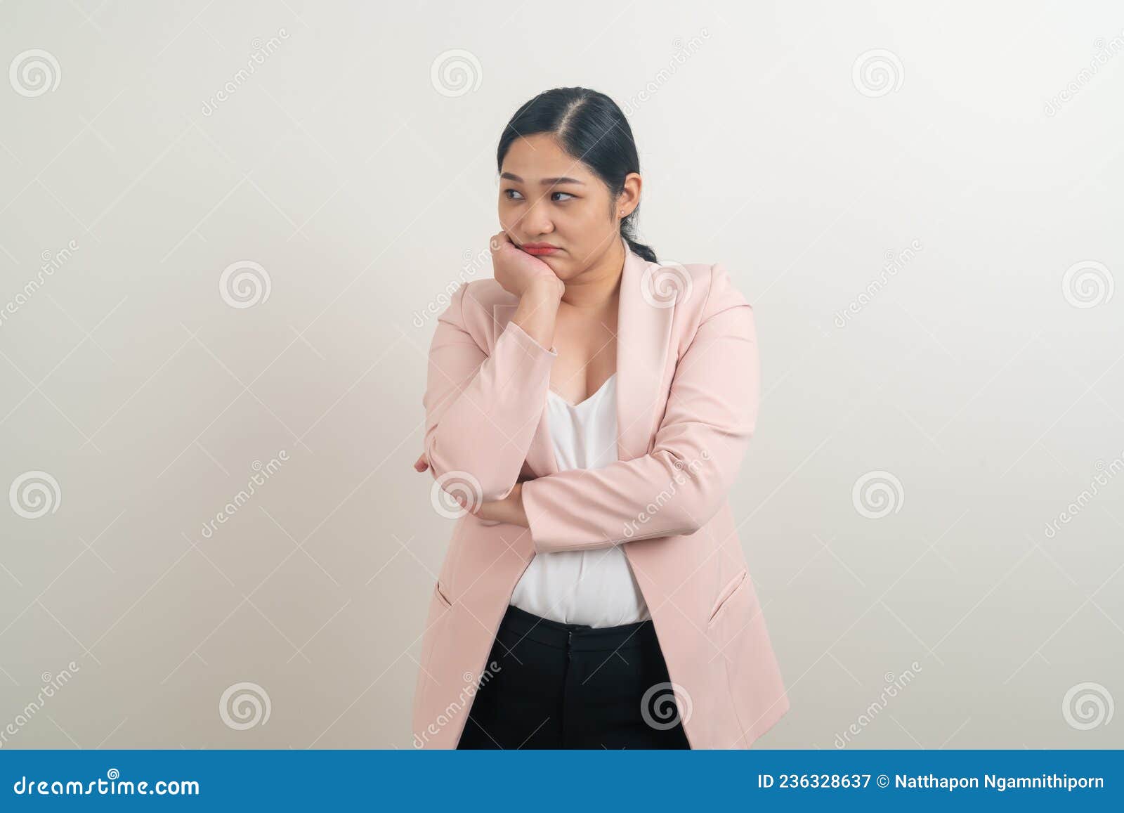 young asian woman with sulk face