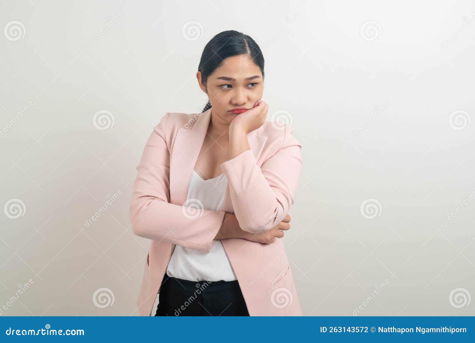 young asian woman with sulk face