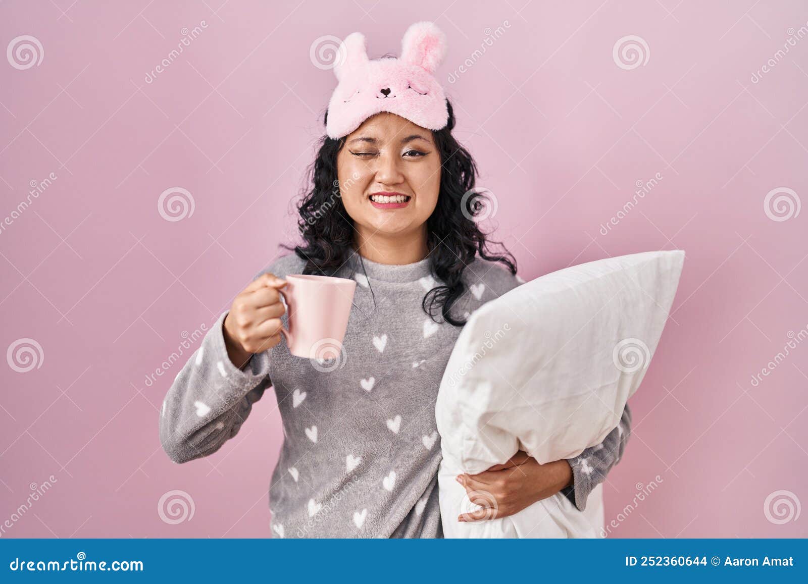 A Young Girl, in a Bra and a Sleeping Mask, Holds a Bottle of Alcohol and  Looks at it. on a Red Background. Stock Photo - Image of excitement,  breast: 106671990