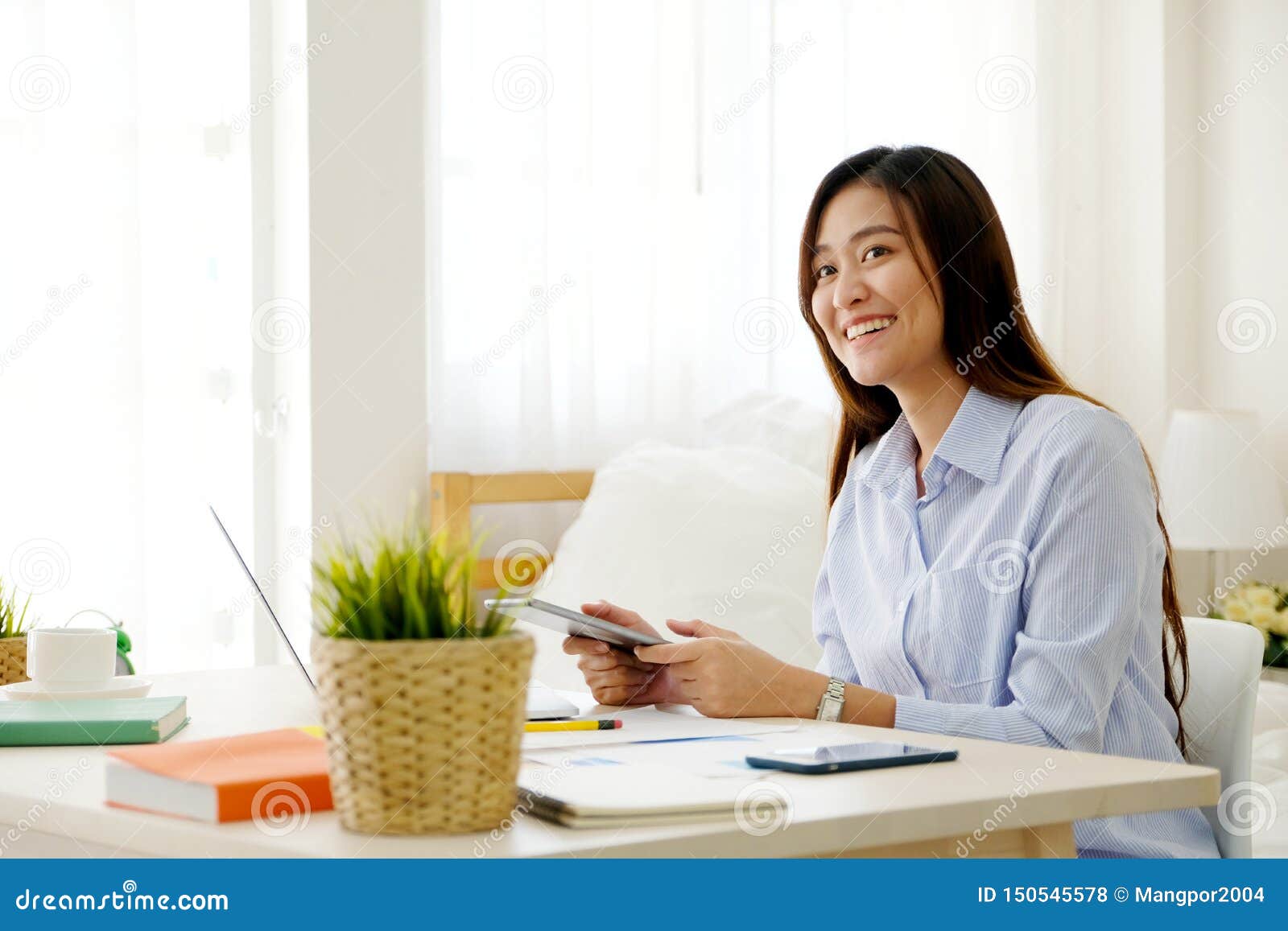 Young Asian Woman Working with Digital Tablet at Home Office with Happy ...