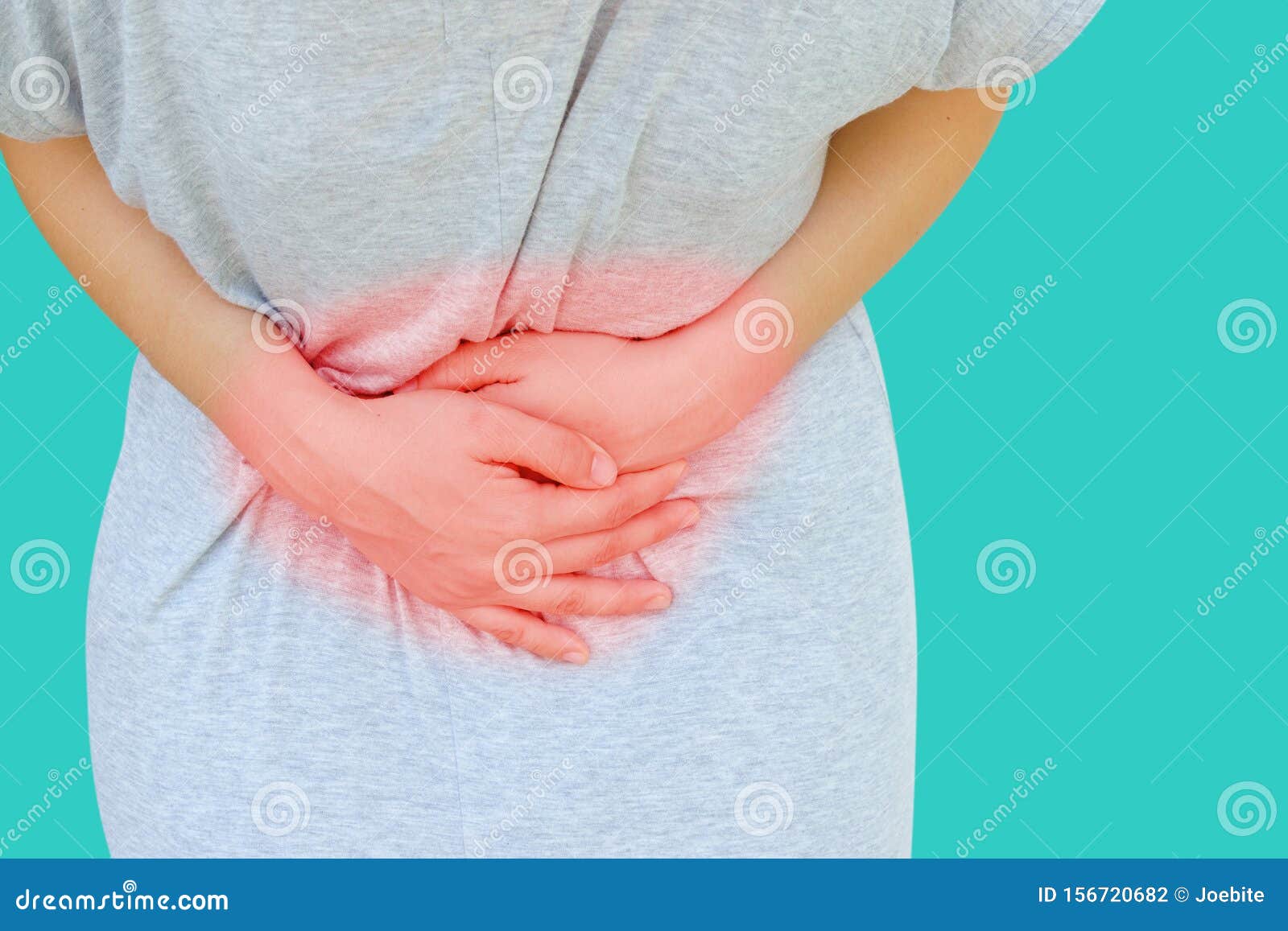 young asian women hold hands in painful areas which may be caused by gastritis, menstruation period cramp, abdominal pain, stomach