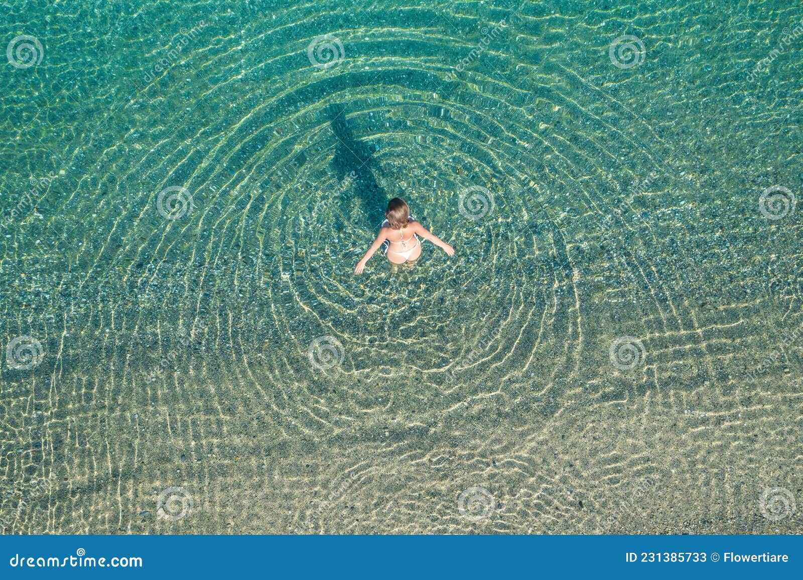 Young Athletic Woman in Swimsuit Walking Barefoot on Coast Entering in ...