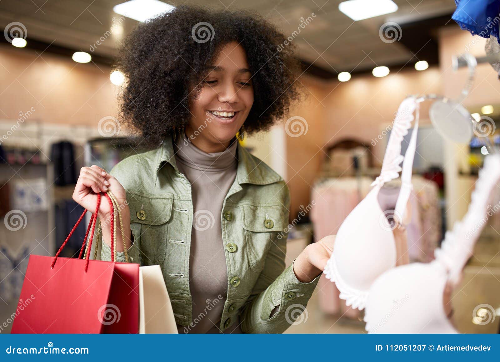 Premium Photo  Two happy multiethnic young mixed race woman shopping for lingerie  near clothing boutique shop window decide whether to purchase african  american girl considers underwear with friend at shop front