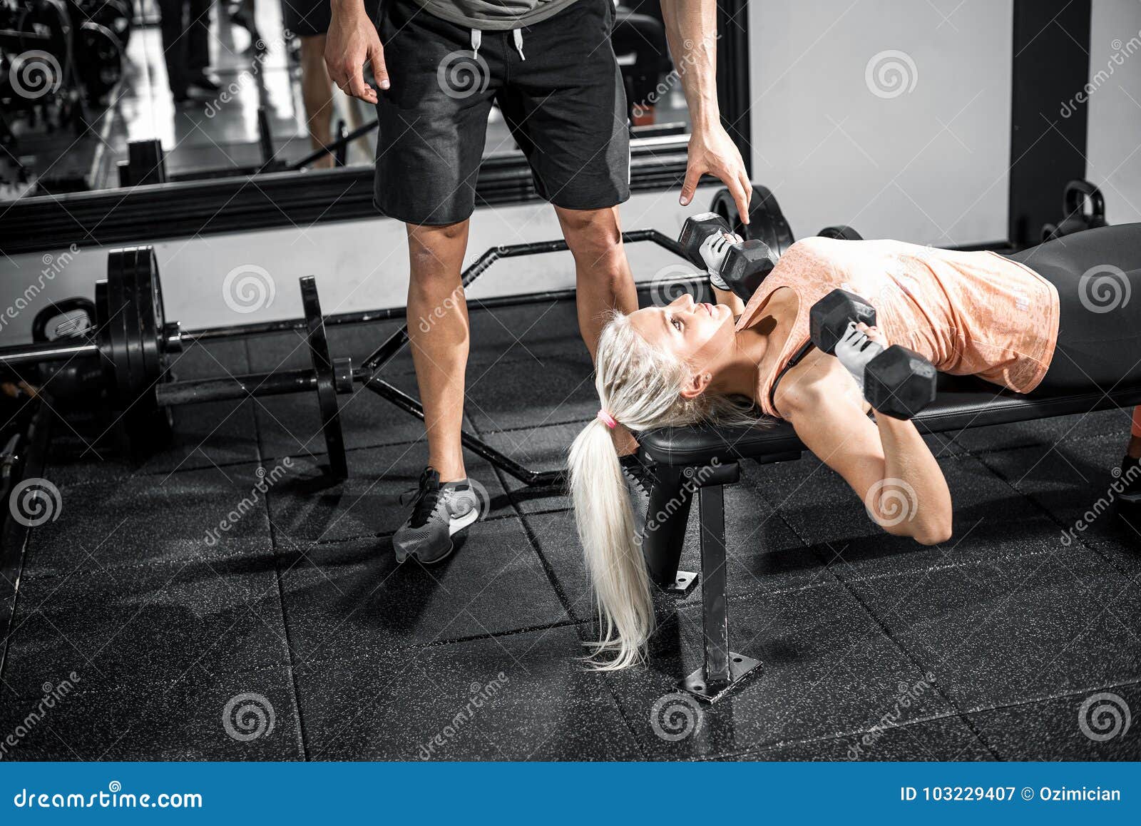 Female Dumbbell Chest Press with Help of Personal Trainer Stock Image -  Image of help, shape: 103229407