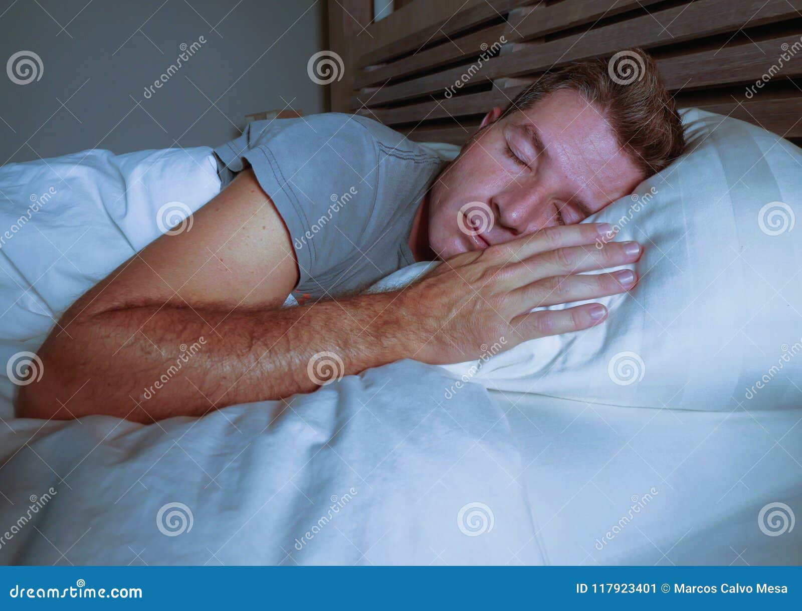 Young Attractive And Handsome Tired Man On His 30s Or 40s In Bed
