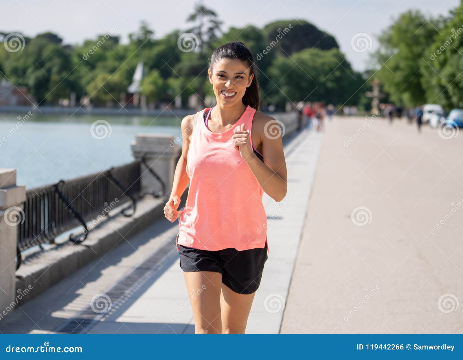 Young Attractive Happy Runner Working Out in a City Party in Fitness ...