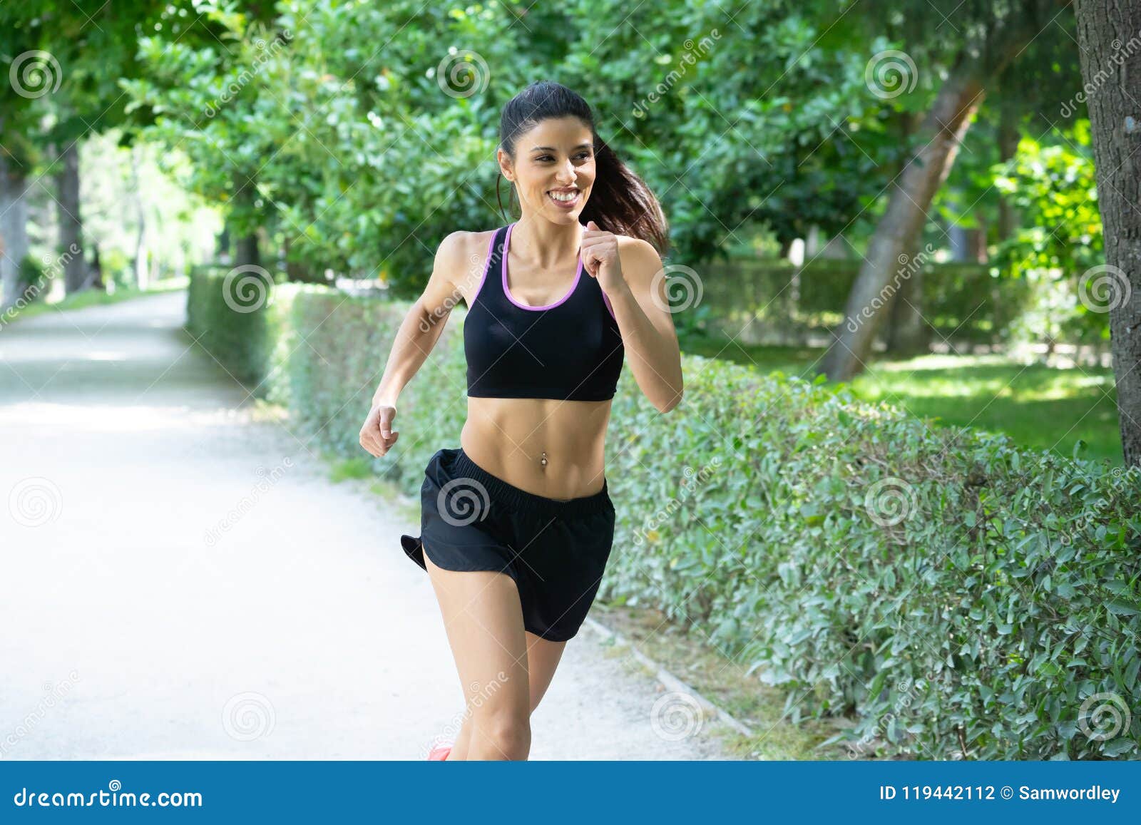 Young Attractive Happy Runner Working Out in a City Party in Fitness ...