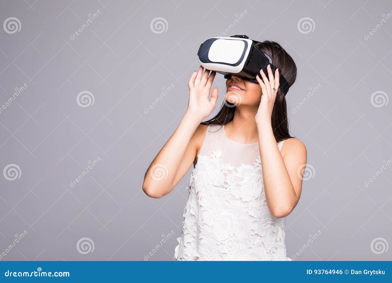 young attractive happy woman excited using 3d goggles watching 360 virtual reality vision enjoying cyber fun experience in vr simu