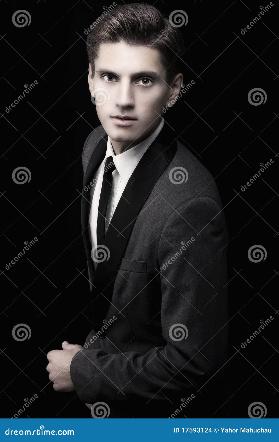 young attractive macho in suit