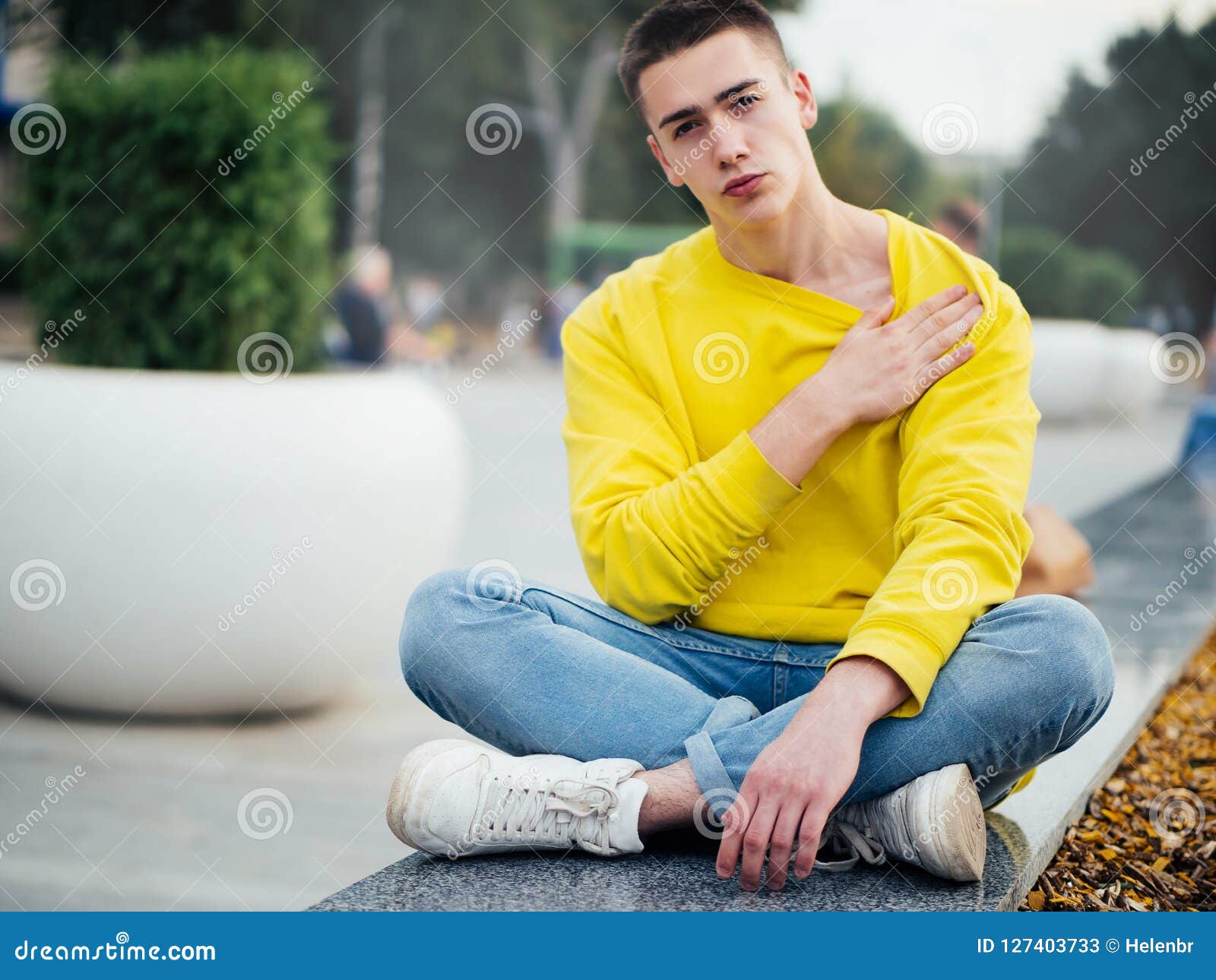 Young Attractive Man in a Yellow Sweater Stock Image - Image of blue ...