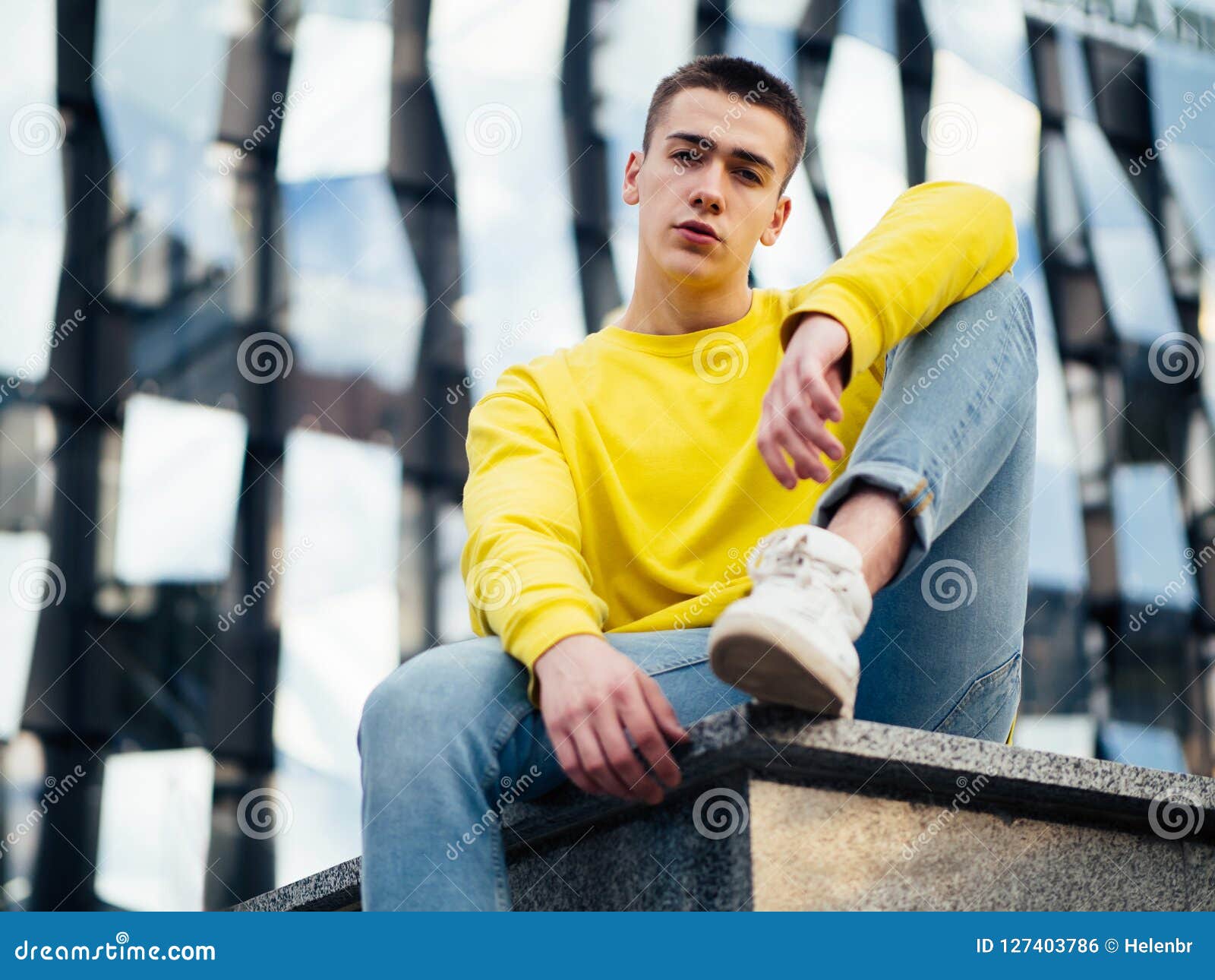 Young Attractive Man In A Yellow Sweater Stock Photo - Image of ...