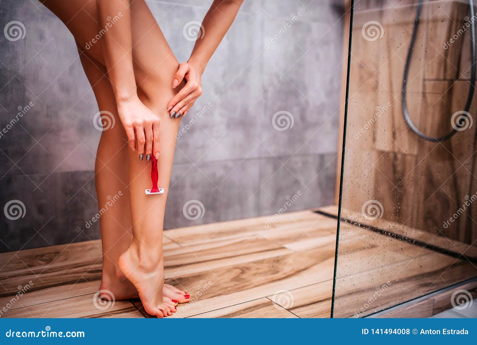 Nude Model Shaving Legs