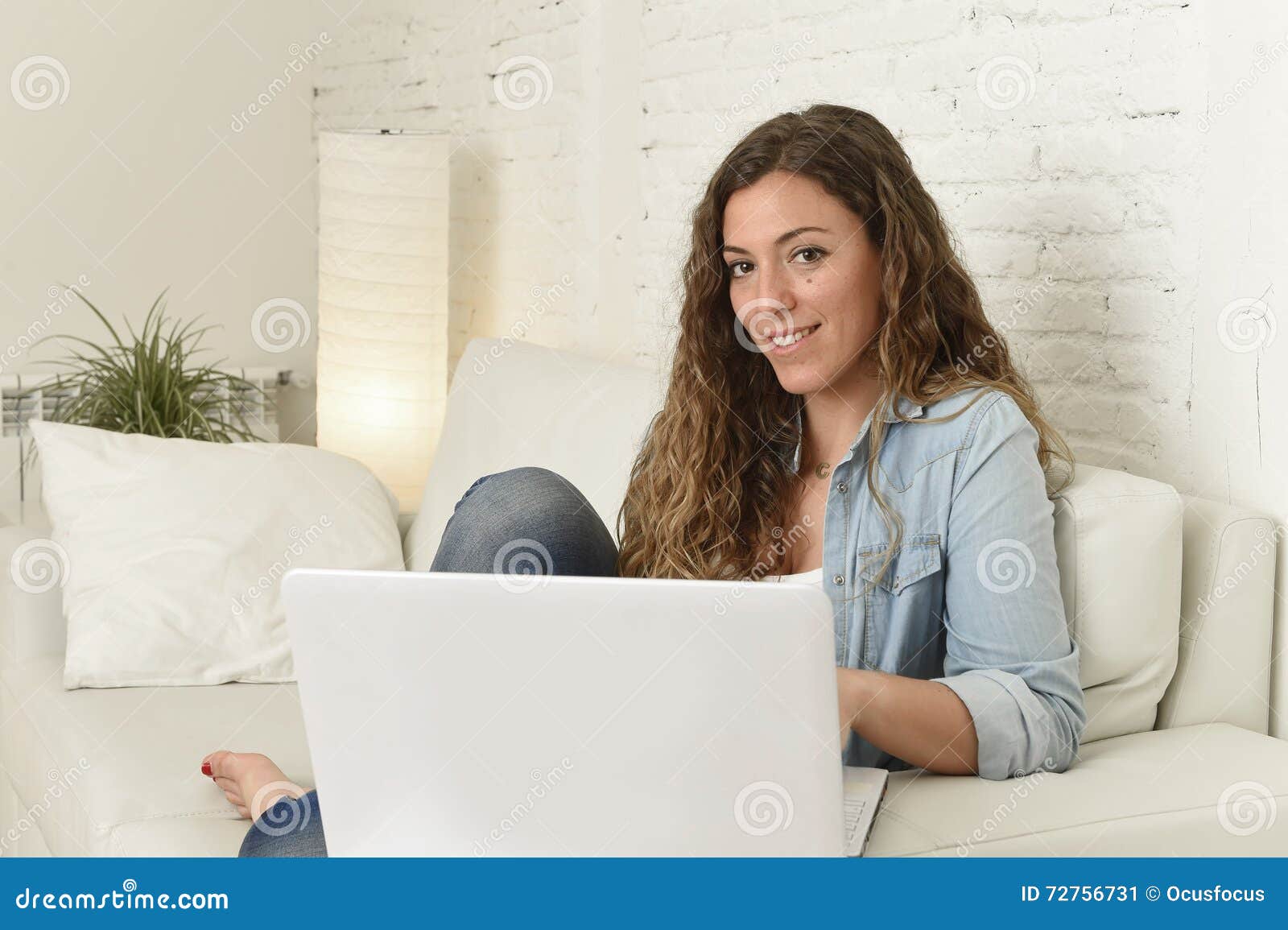 Young Attractive Spanish Woman Using Laptop Computer Sitting Relaxed