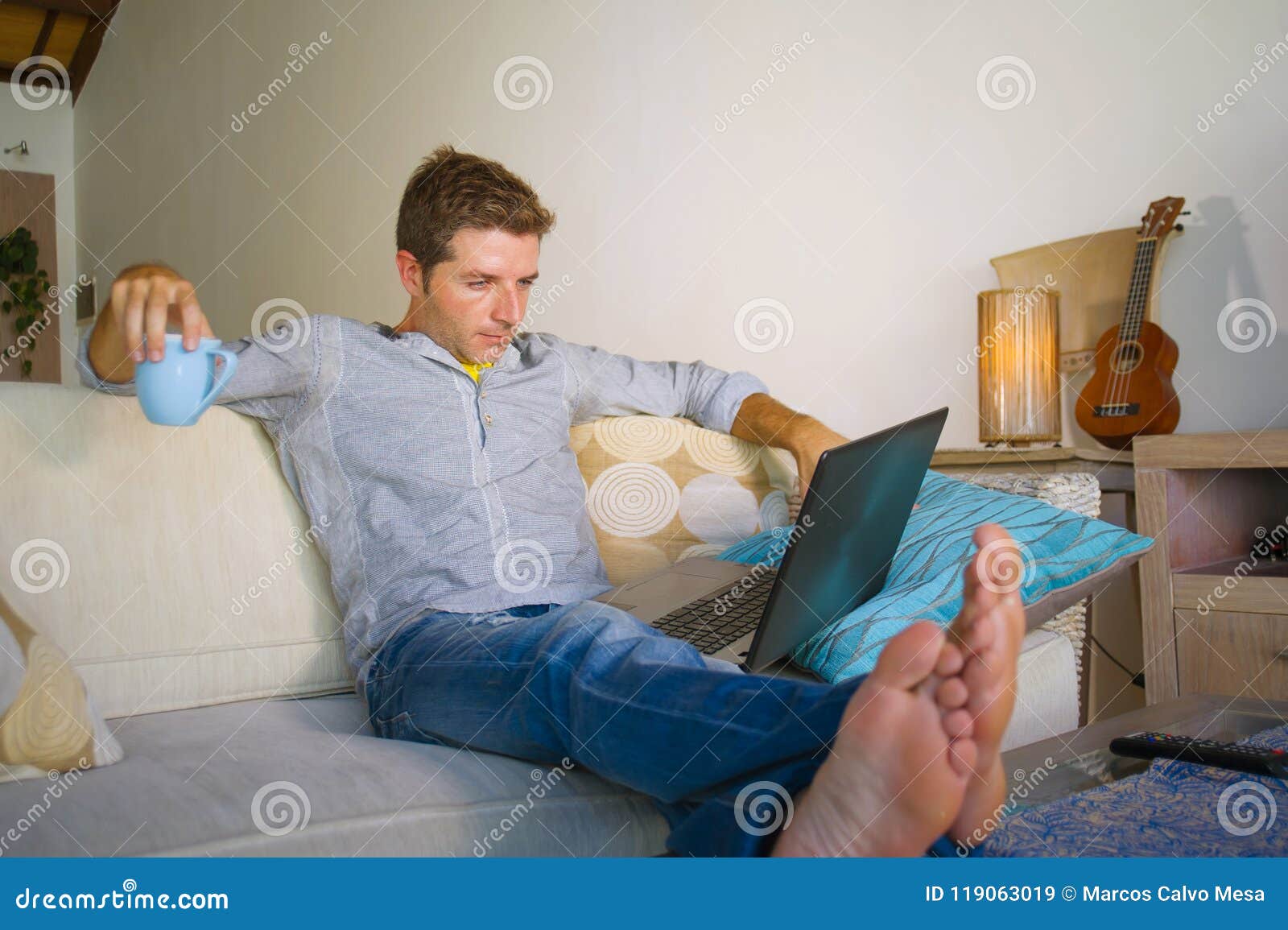 Young Attractive and Successful Man Working from Home Living Room ...
