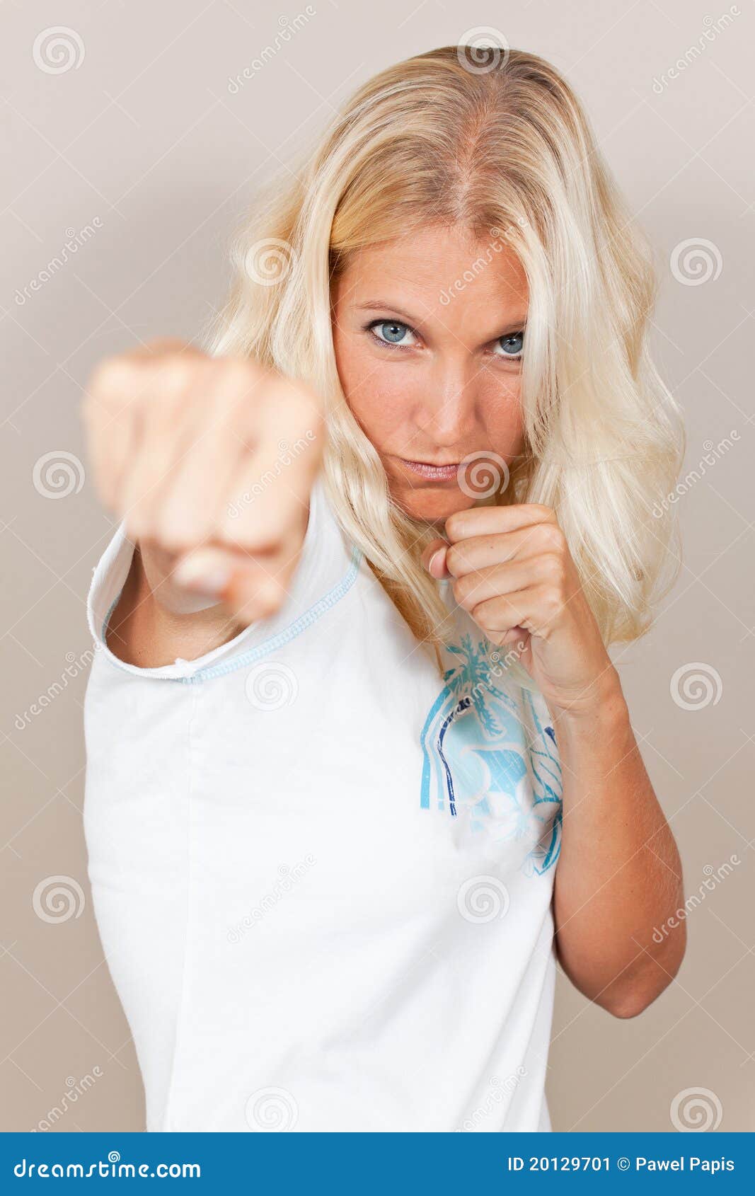 Young Attractive Woman Attacks With A Punch Stock Image - Image of