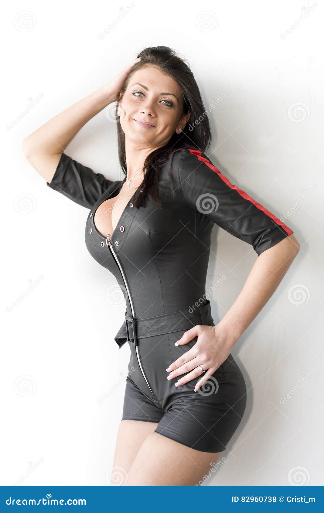 Young Attractive Woman with Big Round Boobs Wearing a Racing