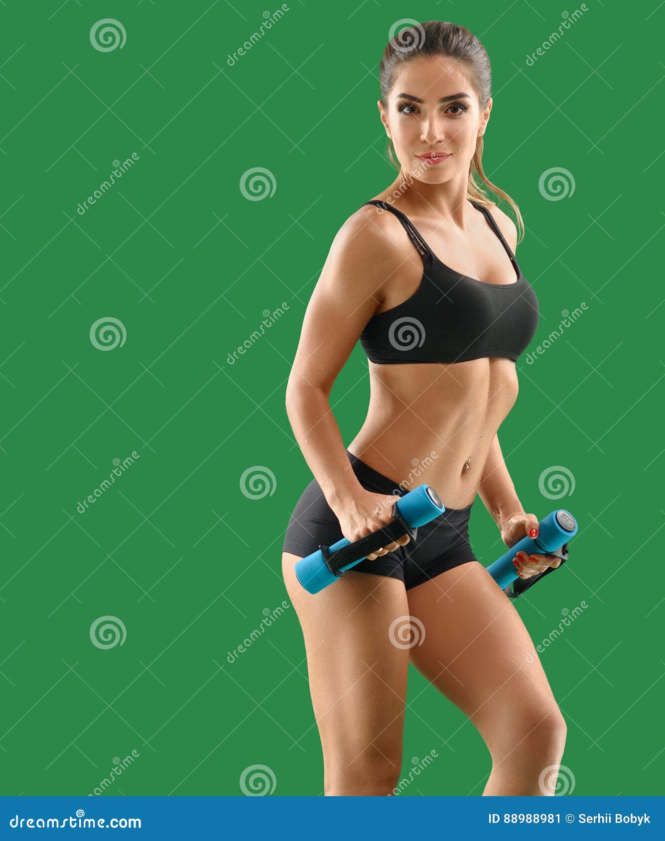 Young Woman Posing And Showing Biceps Stock Photo, Picture and Royalty Free  Image. Image 95690136.