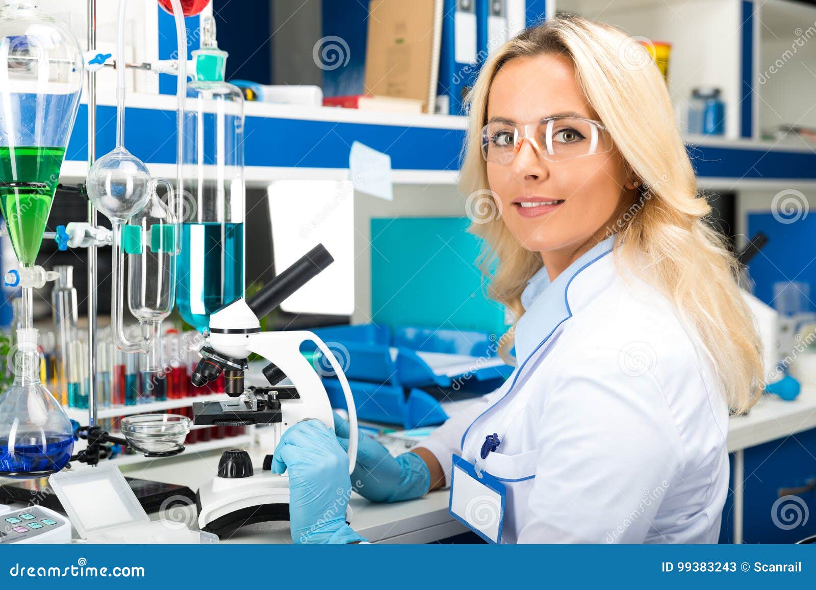 young attractive woman scientist researching in the laboratory