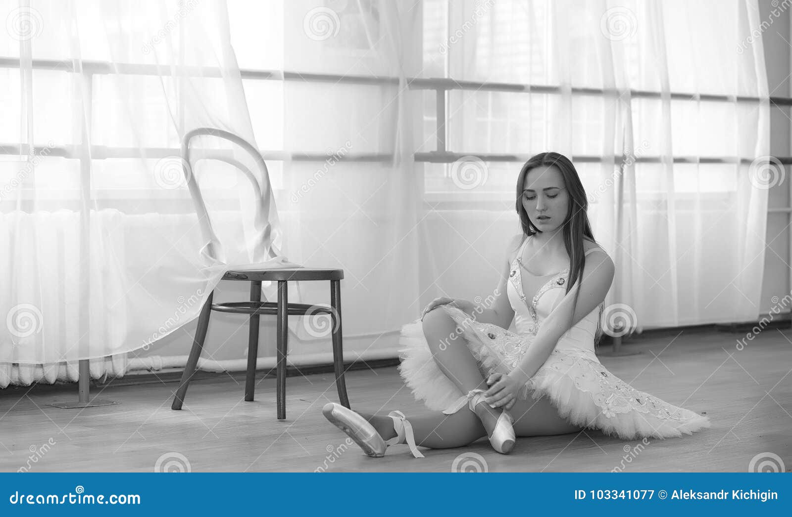 Young Ballet Dancer On A Warm-up. The Ballerina Is Preparing To Stock
