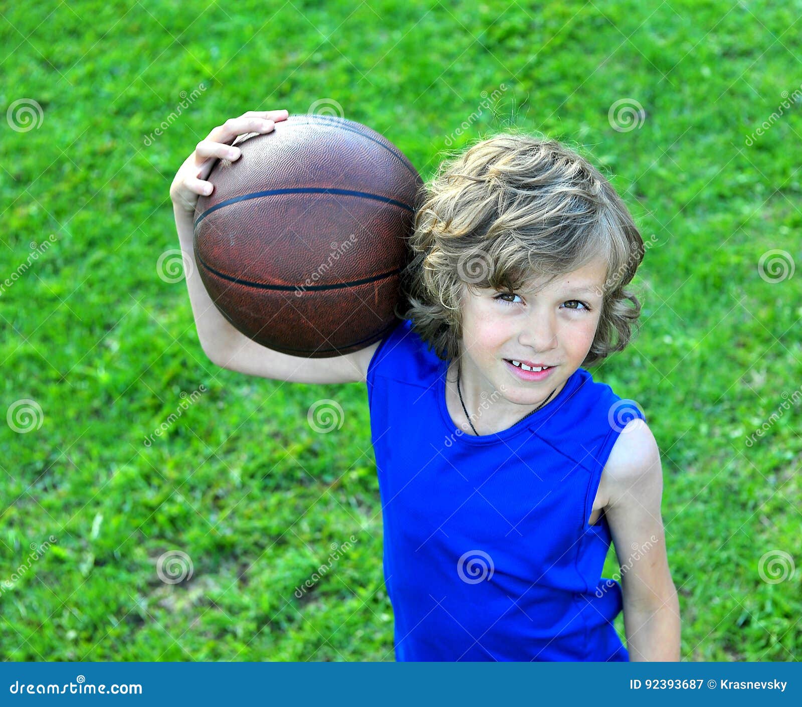 Young Basketball Player Holding the Ball Stock Image Image of grass