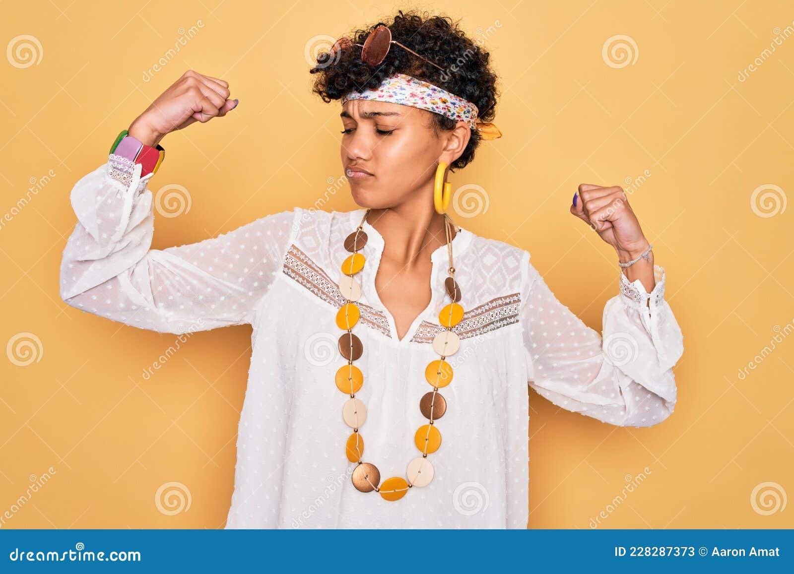 Young Beautiful African American Afro Hippie Woman Wearing Sunglasses and  Accessories Showing Arms Muscles Smiling Proud Stock Image - Image of  fitness, retro: 228287373