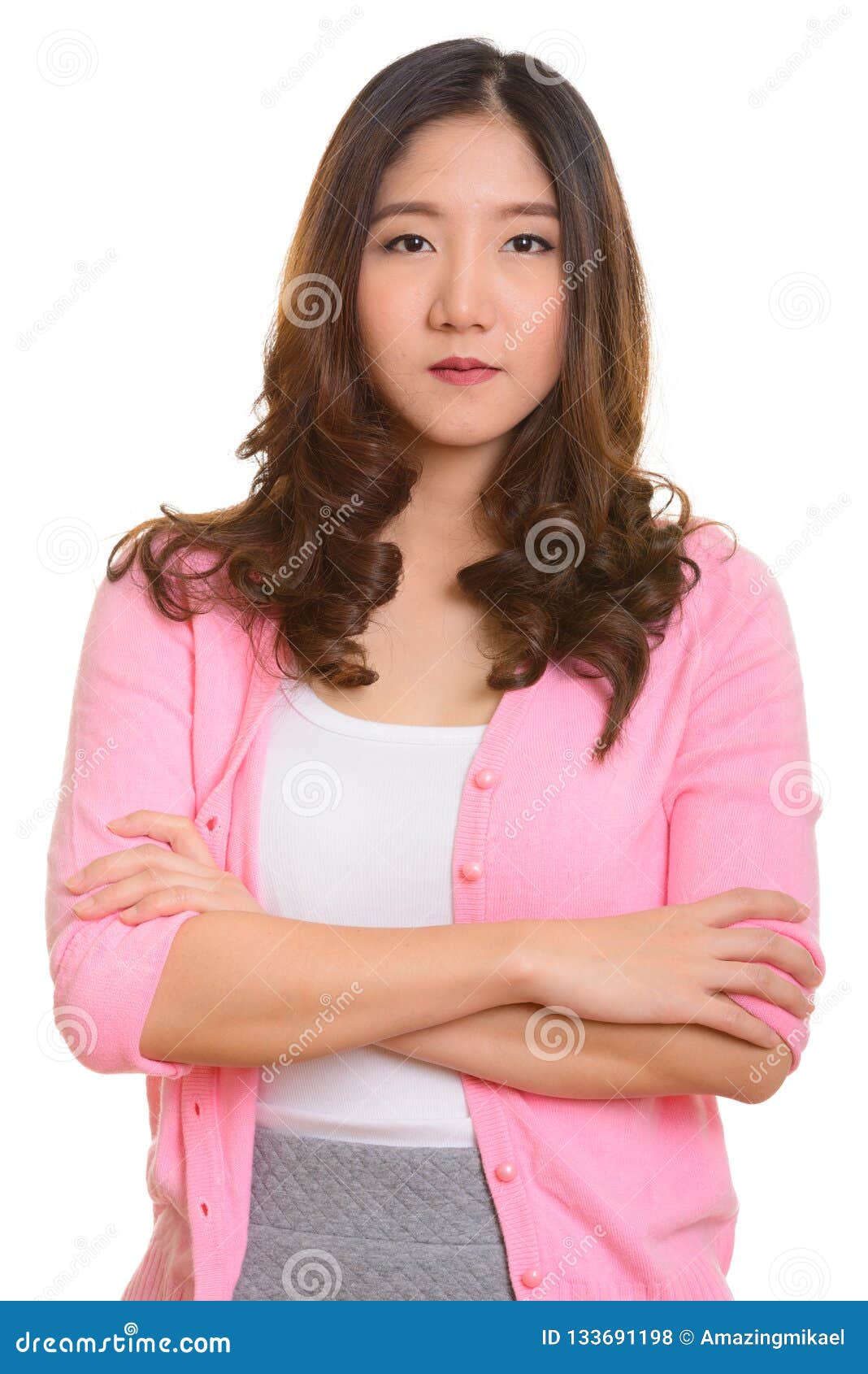 Portrait of Young Beautiful Asian Woman with Arms Crossed Stock Photo ...