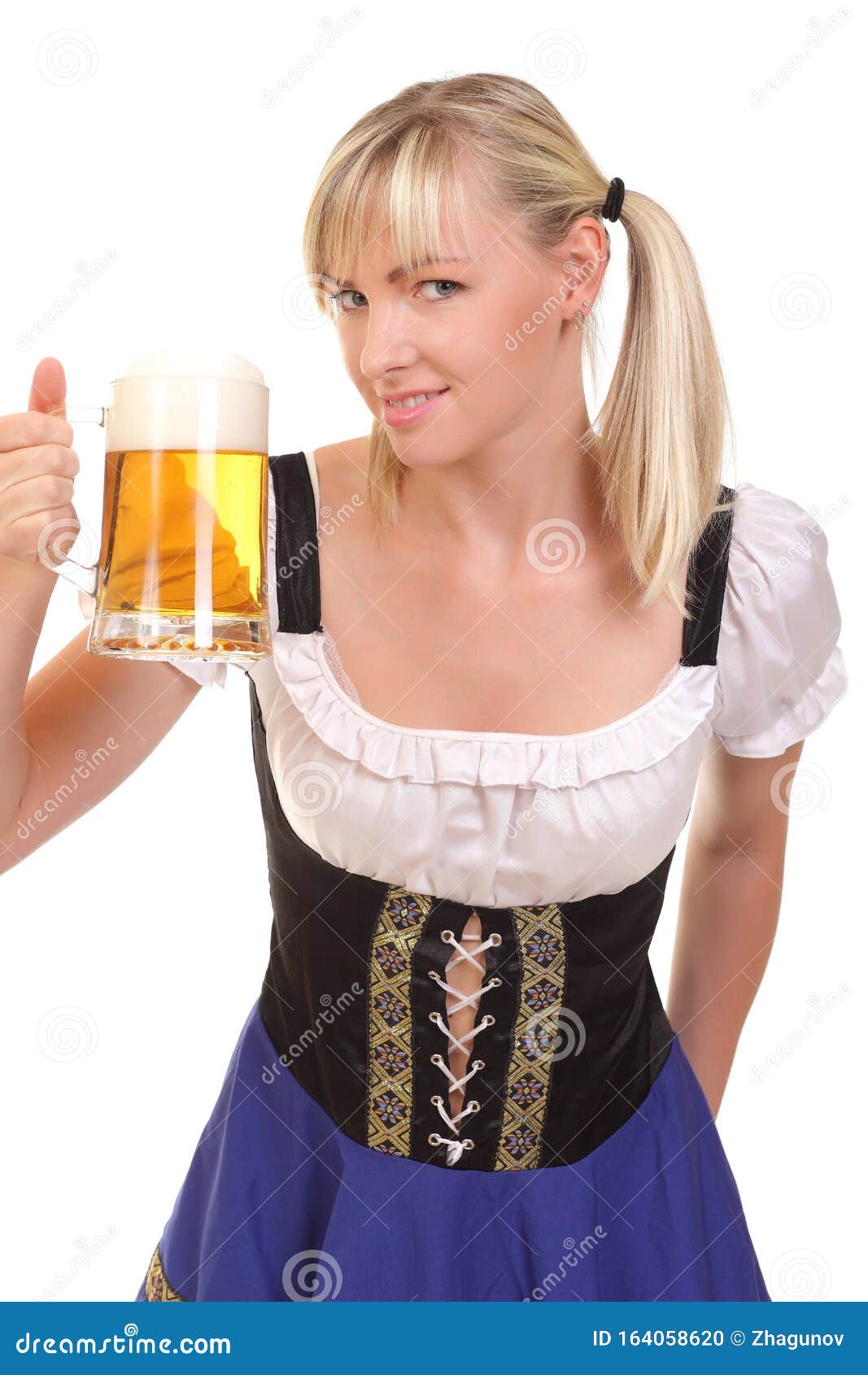 Young and Beautiful Bavarian Girl Stock Photo - Image of drink, dress ...