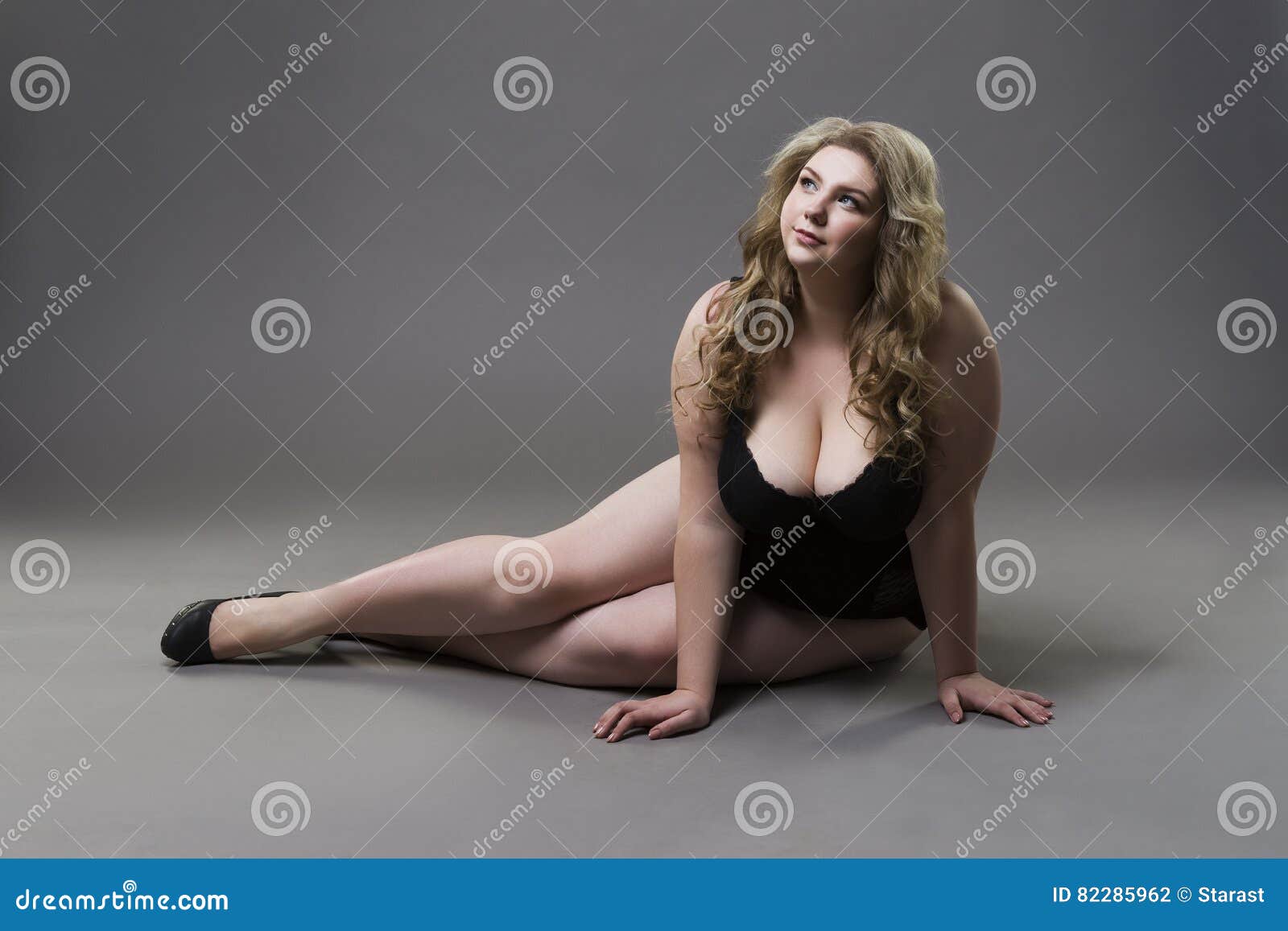 Young Beautiful Blonde Plus Size Model With Big Natural Breasts In Underwear,  Xxl Woman In Lingerie On Gray Studio Background Stock Photo, Picture and  Royalty Free Image. Image 72437069.