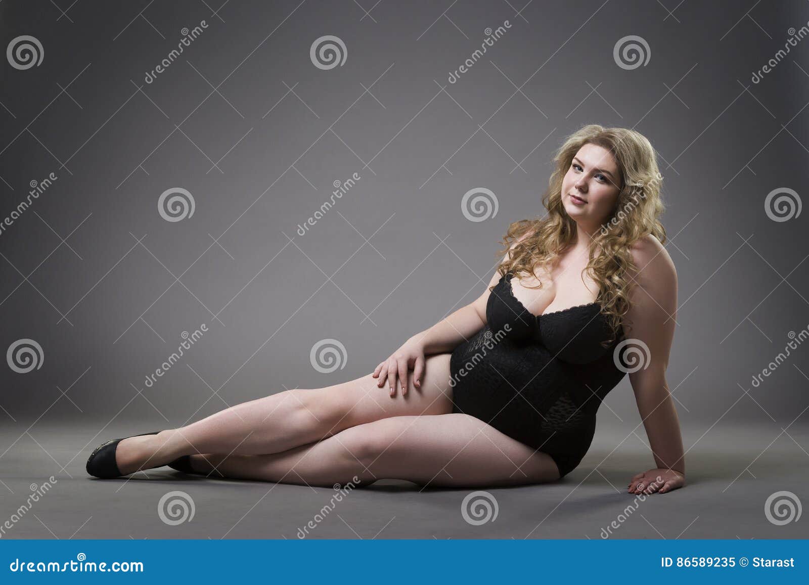 Young Beautiful Blonde Plus Size Model With Big Natural Breasts In  Underwear, Xxl Woman In Lingerie On Gray Studio Background Stock Photo,  Picture and Royalty Free Image. Image 72437069.