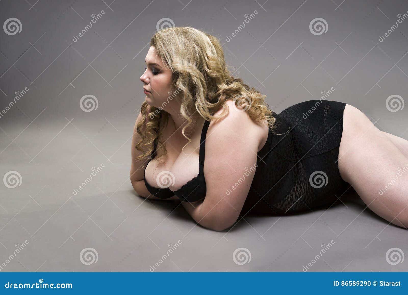 Young Beautiful Blonde Plus Size Model With Big Natural Breasts In Underwear,  Xxl Woman In Lingerie On Gray Studio Background Stock Photo, Picture and  Royalty Free Image. Image 72437069.