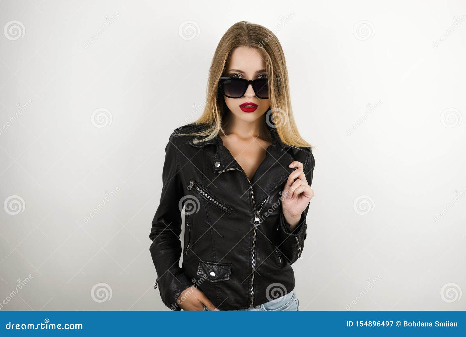 Young Beautiful Blonde Woman in Sun Glasses Wearing Leather Jacket ...