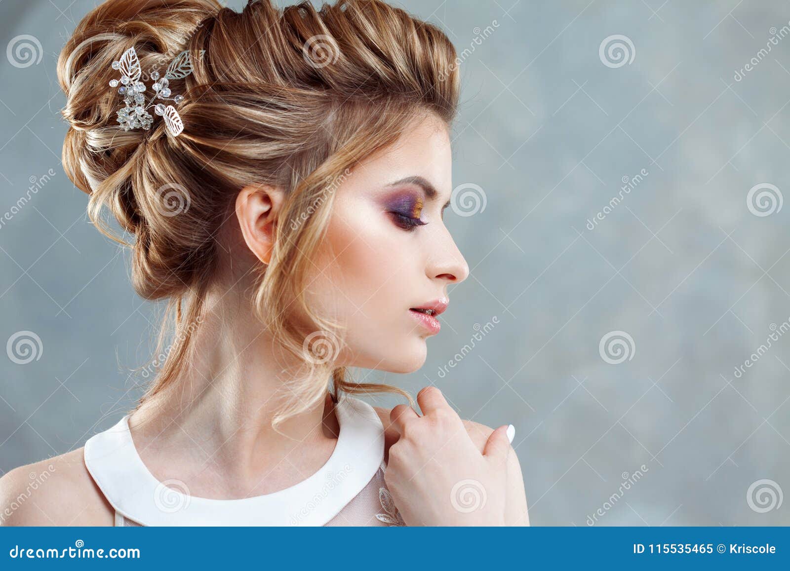 Young Beautiful Bride With An Elegant High Hairdo Wedding